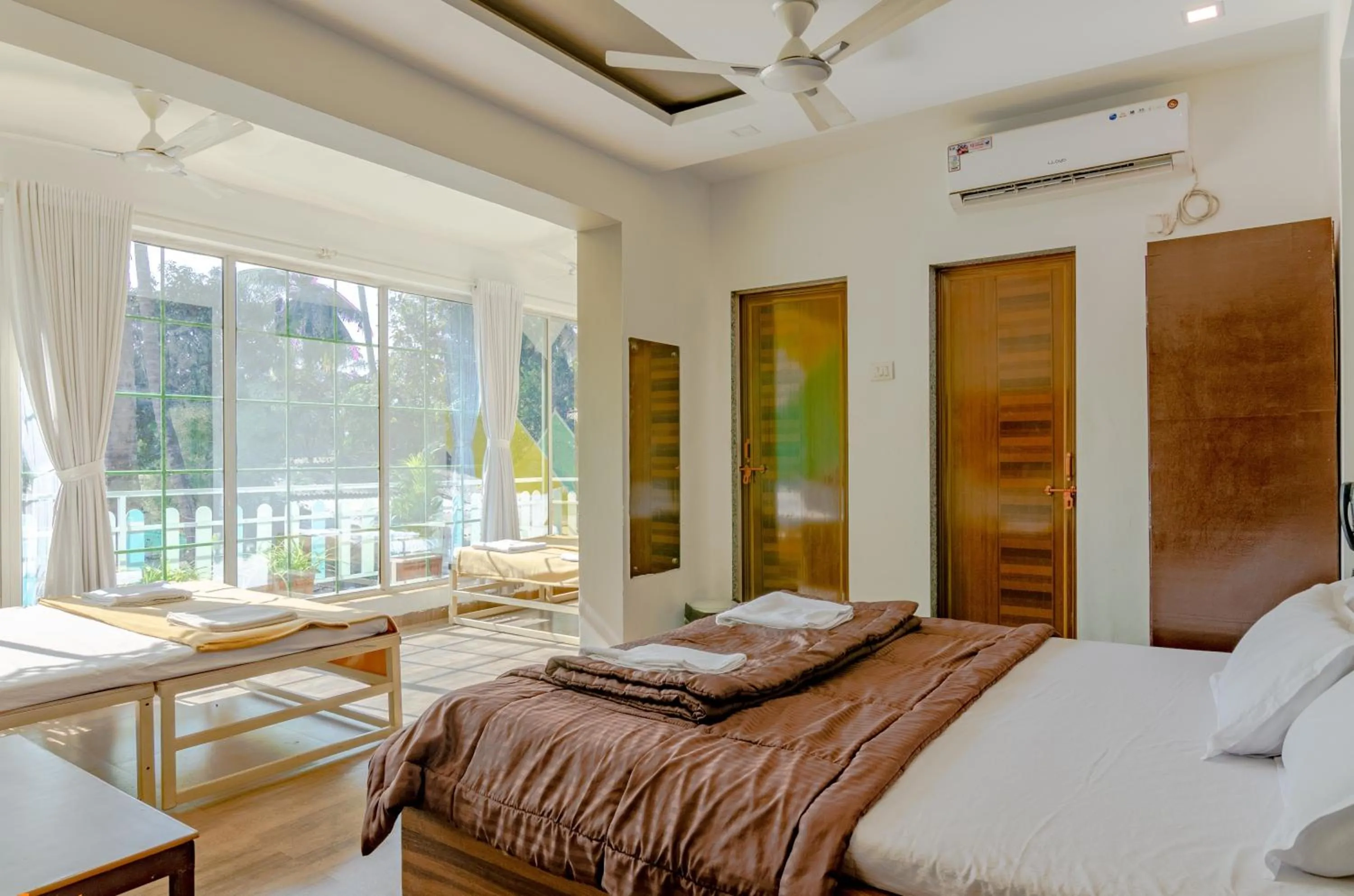 Bed in White House Beach Resort, Nagaon