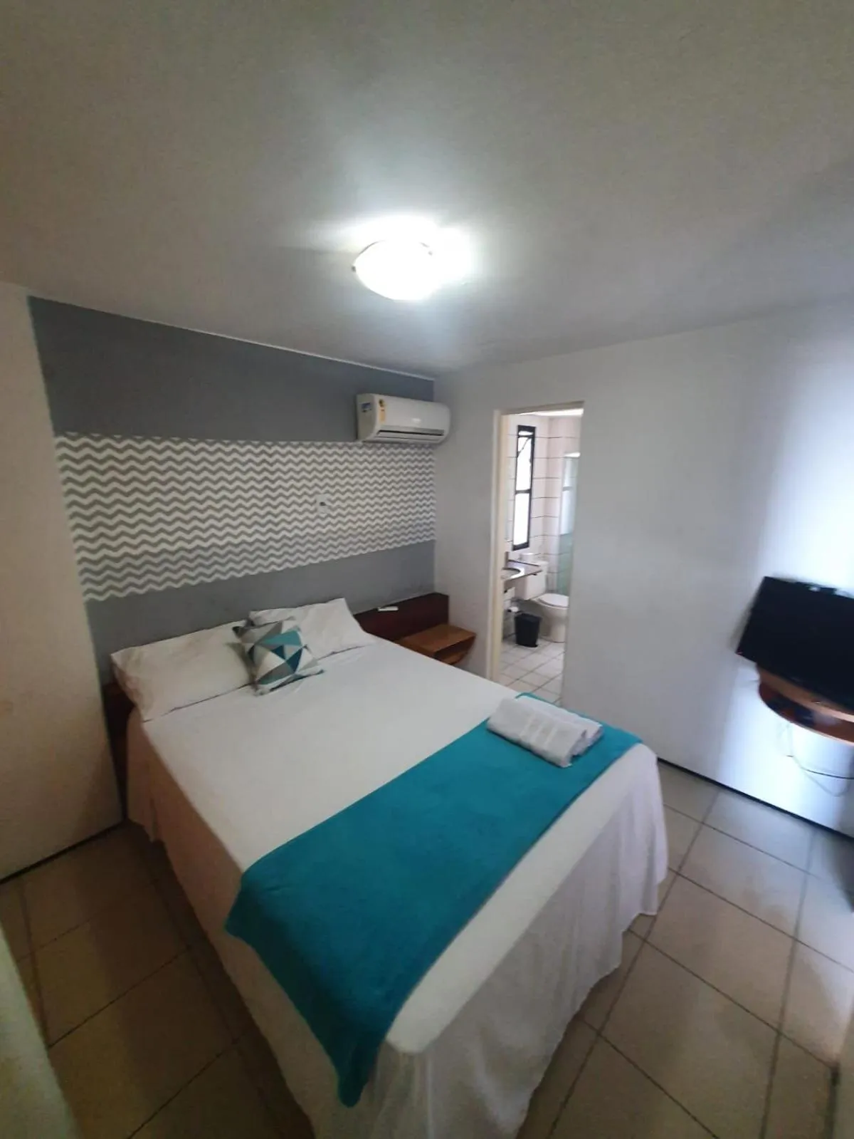 Bedroom, Bed in Praia Mansa Suíte Hotel