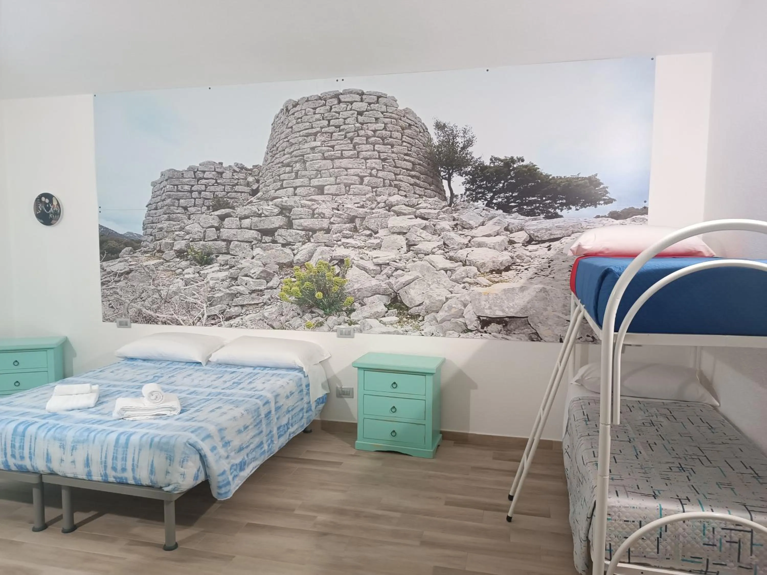 Bed in bed and breakfast Murales Orgosolo