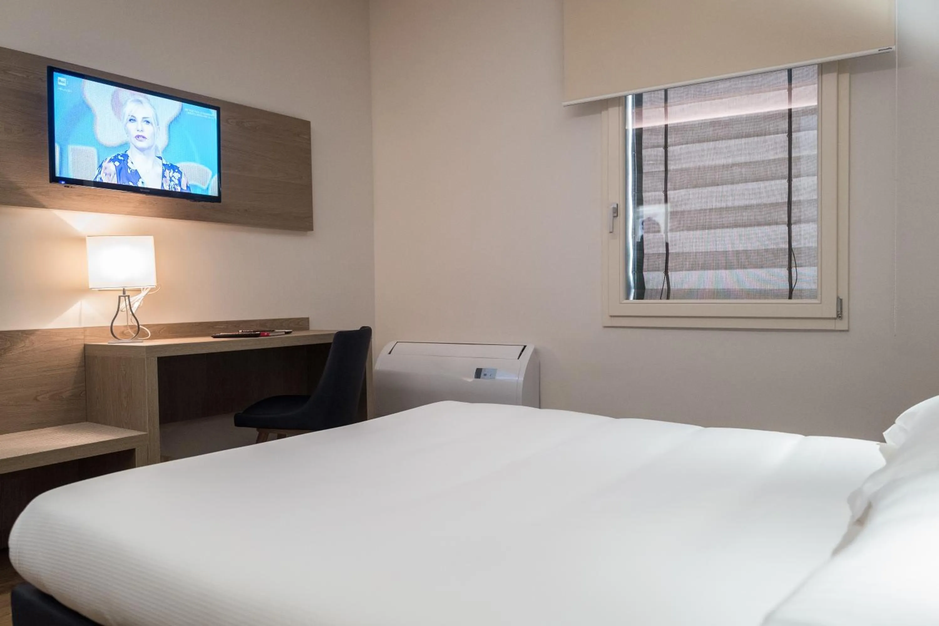 Bed in Hotel Touring