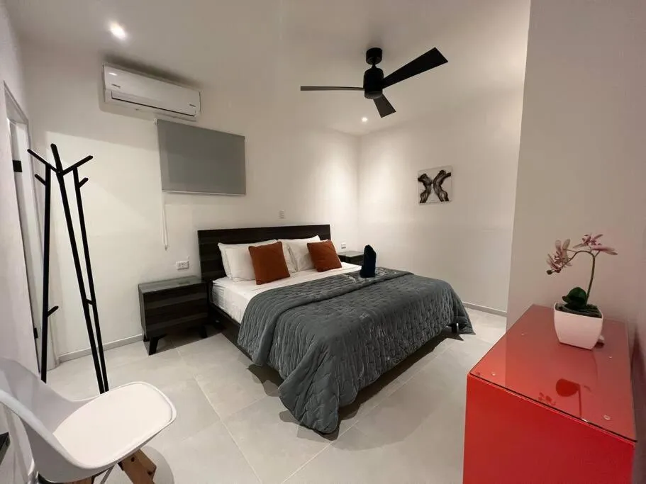 Photo of the whole room, Bed in The Backyard Beach House