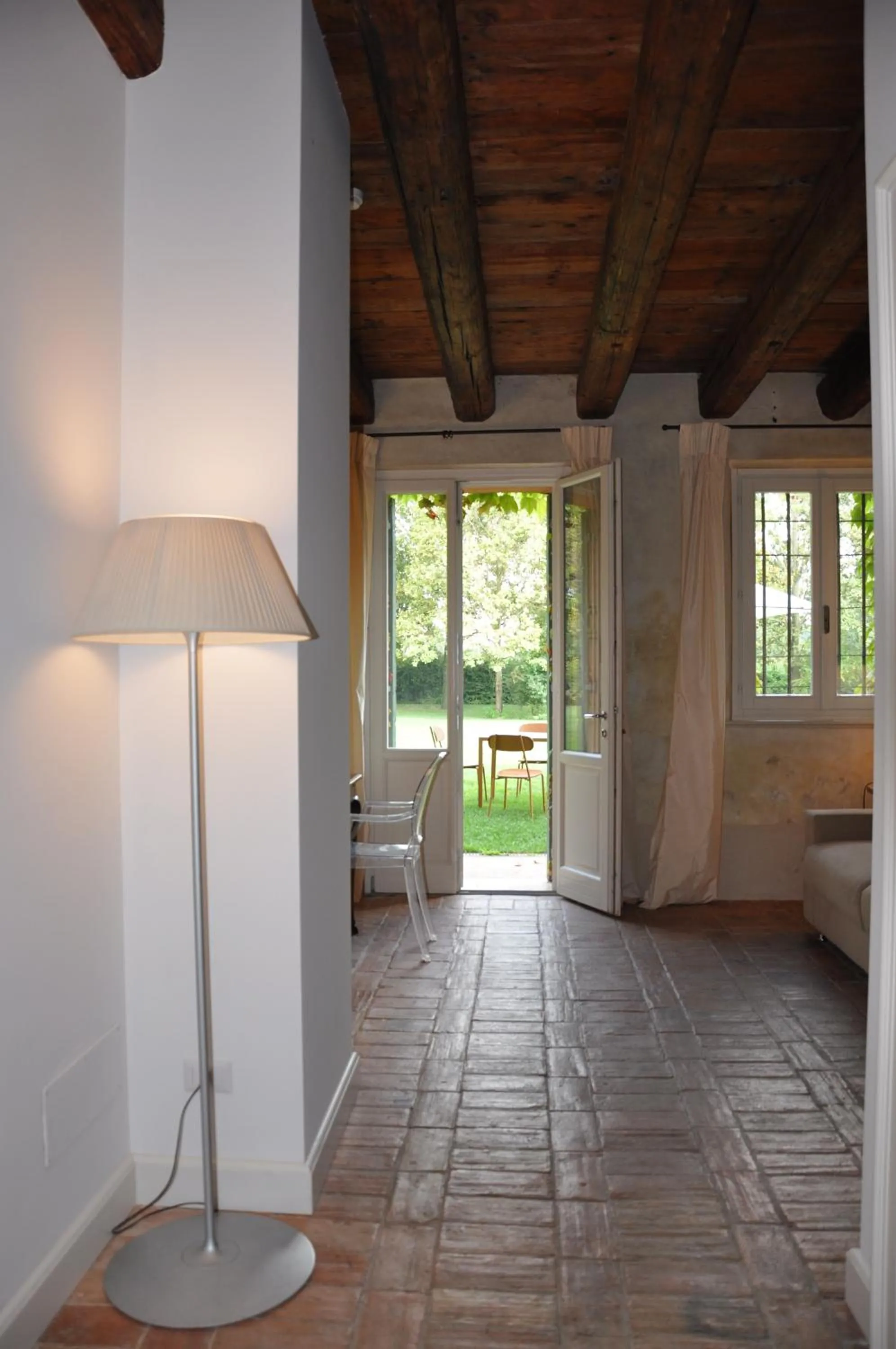 Deluxe One-Bedroom Apartment with Garden View in Relais Corte Guastalla Apartments
