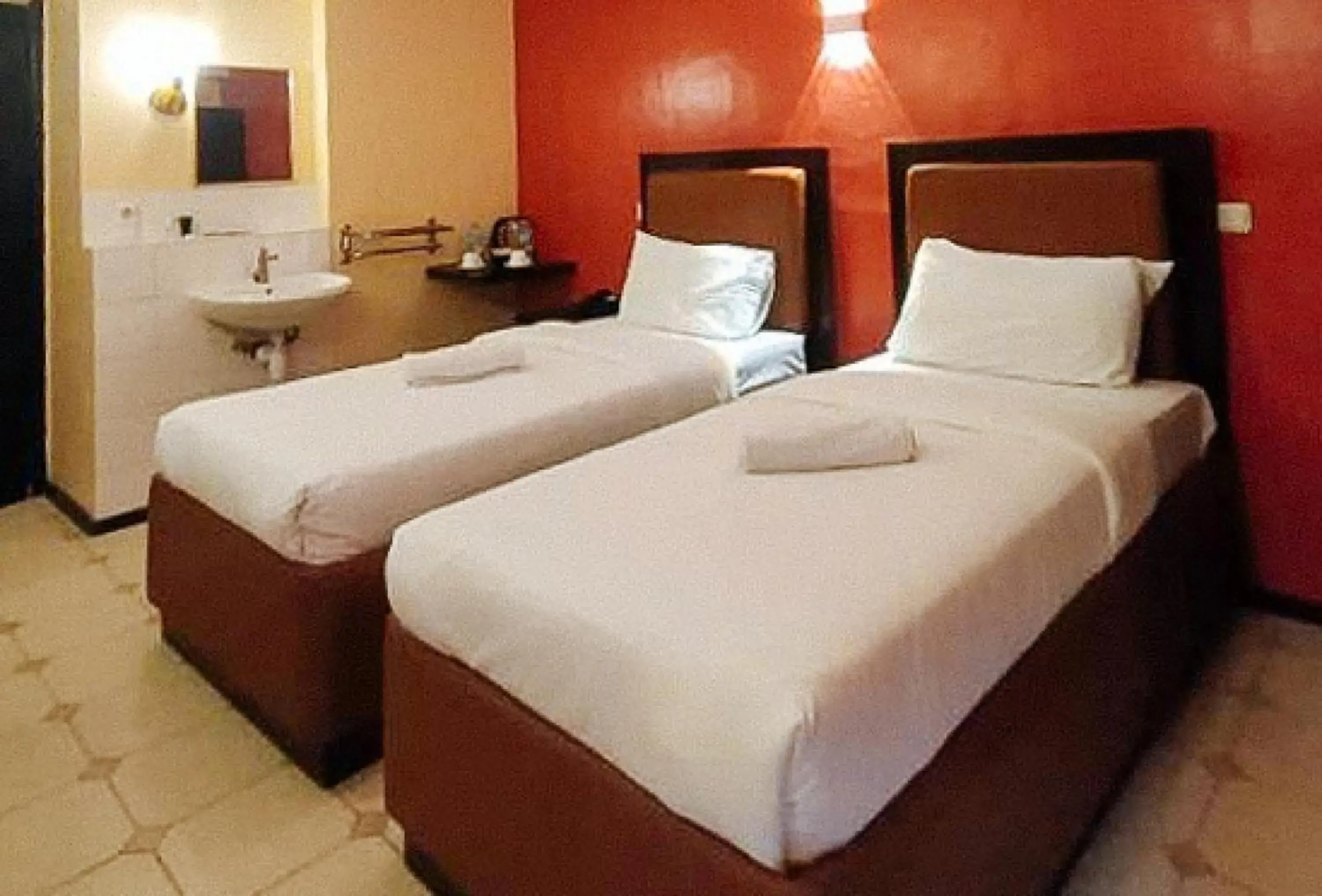 Bed in RedDoorz at Carlton-Martin Hotel Masbate City Bed in RedDoorz at Carlton-Martin Hotel Masbate City