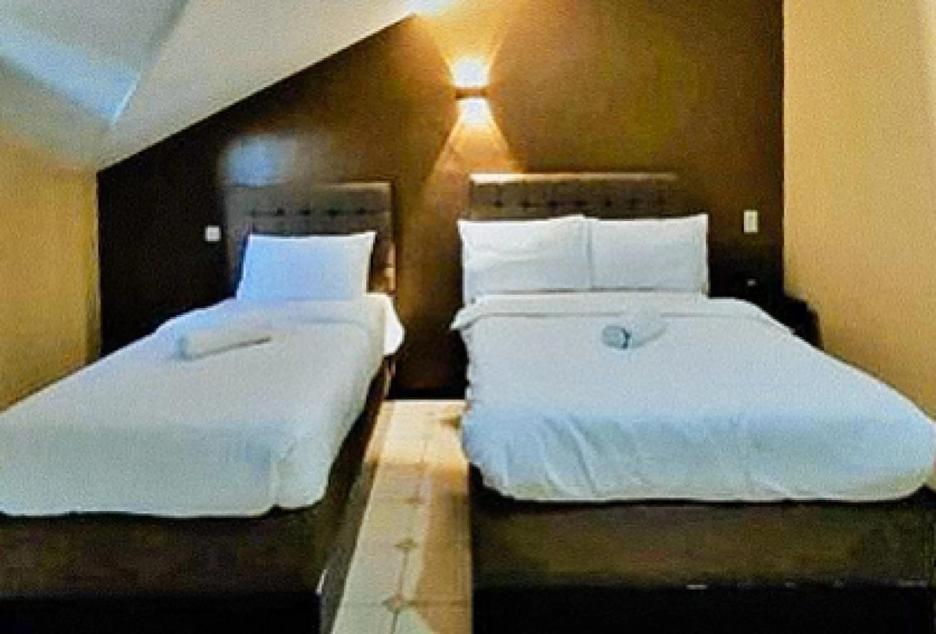 Bed in RedDoorz at Carlton-Martin Hotel Masbate City