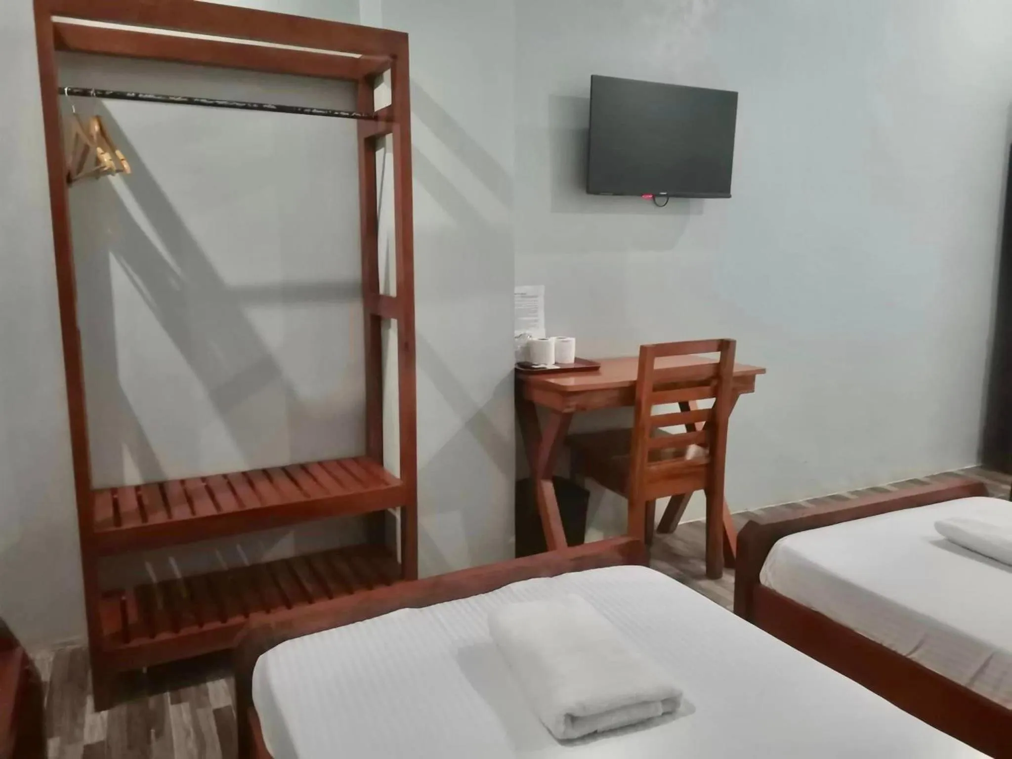 Bed in RedDoorz at Gracia's Calzada Inn Camiguin