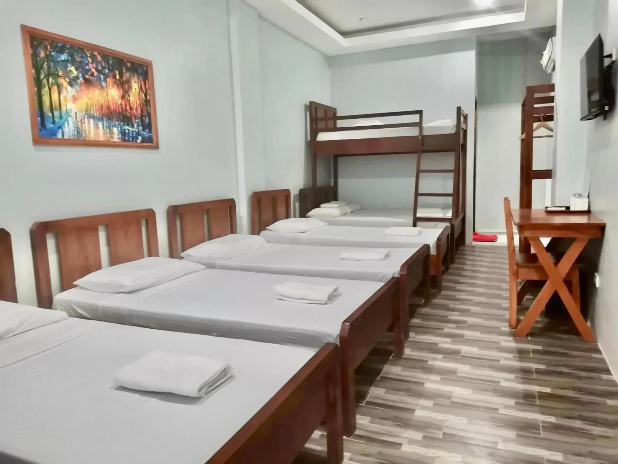 Bed in RedDoorz at Gracia's Calzada Inn Camiguin Bed in RedDoorz at Gracia's Calzada Inn Camiguin