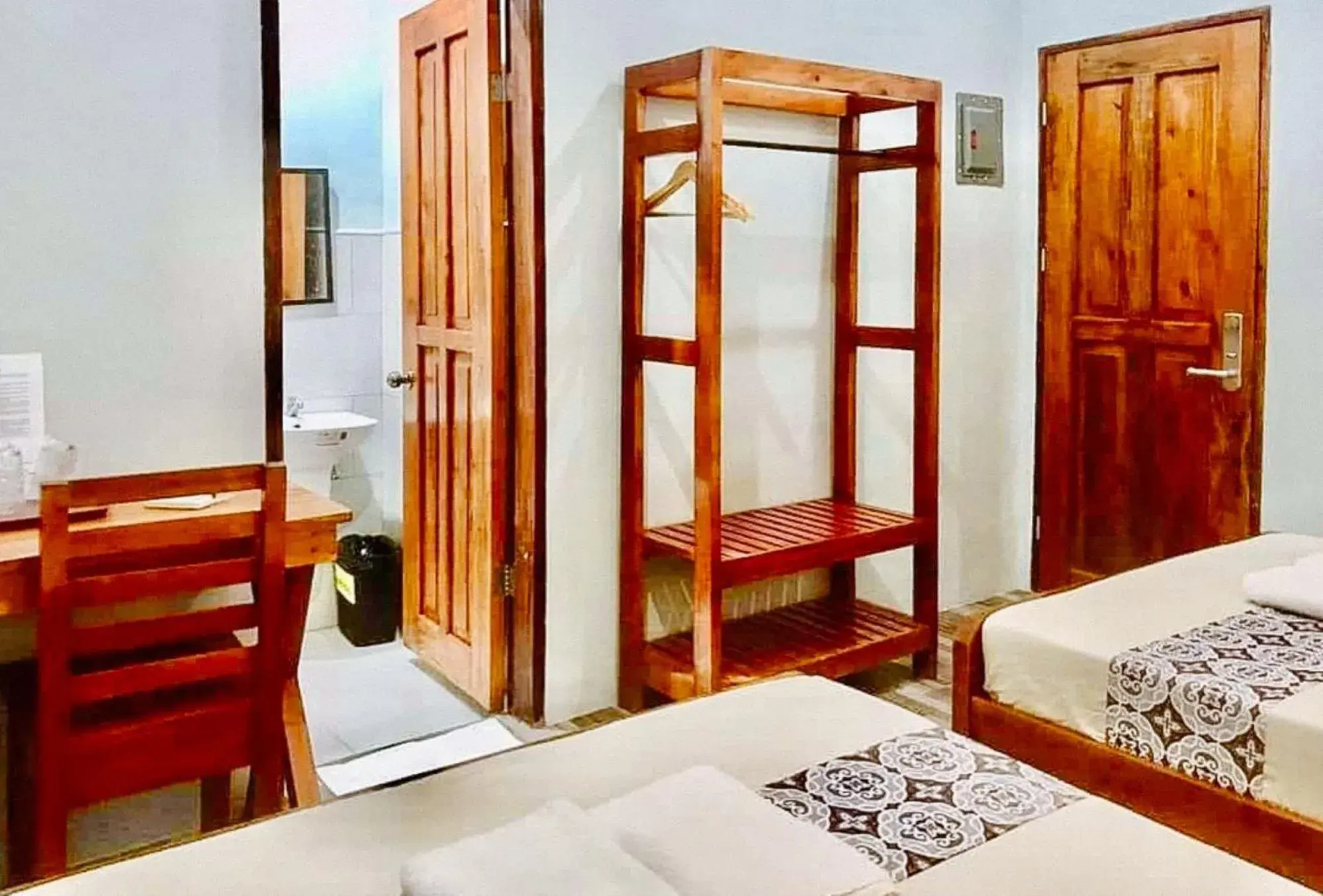 Photo of the whole room, Bed in RedDoorz at Gracia's Calzada Inn Camiguin Photo of the whole room, Bed in RedDoorz at Gracia's Calzada Inn Camiguin