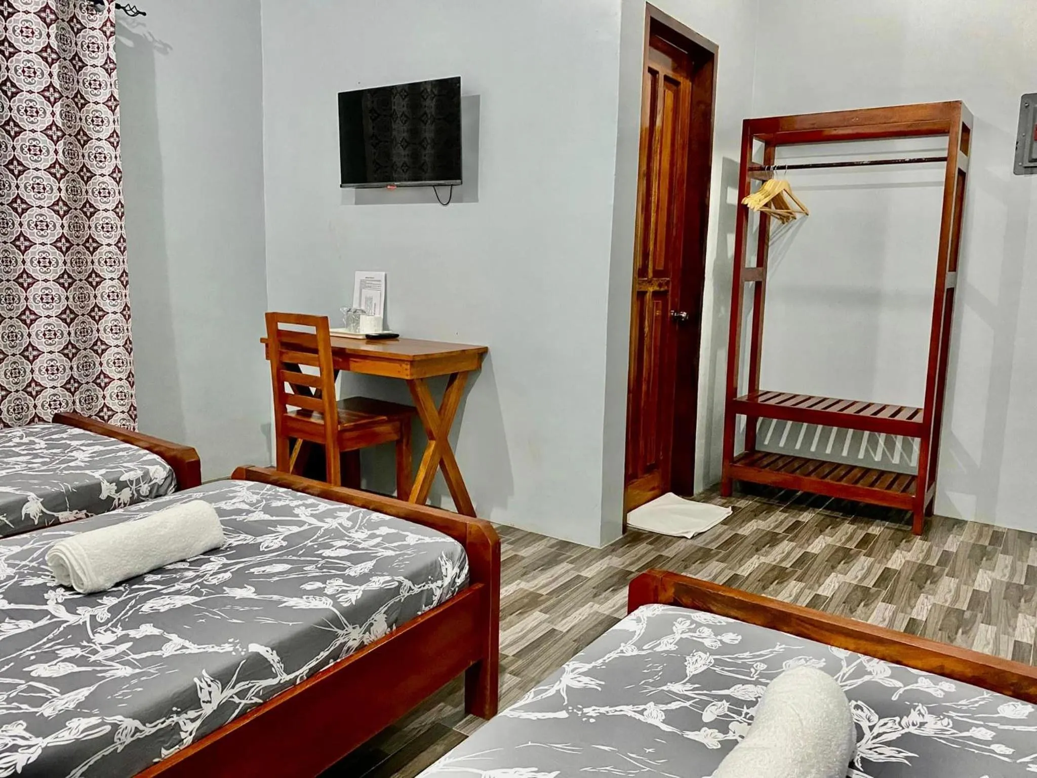 Bed in RedDoorz at Gracia's Calzada Inn Camiguin