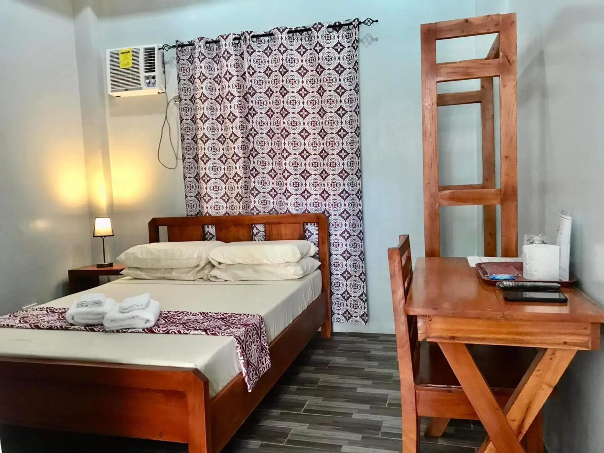 Bed in RedDoorz at Gracia's Calzada Inn Camiguin