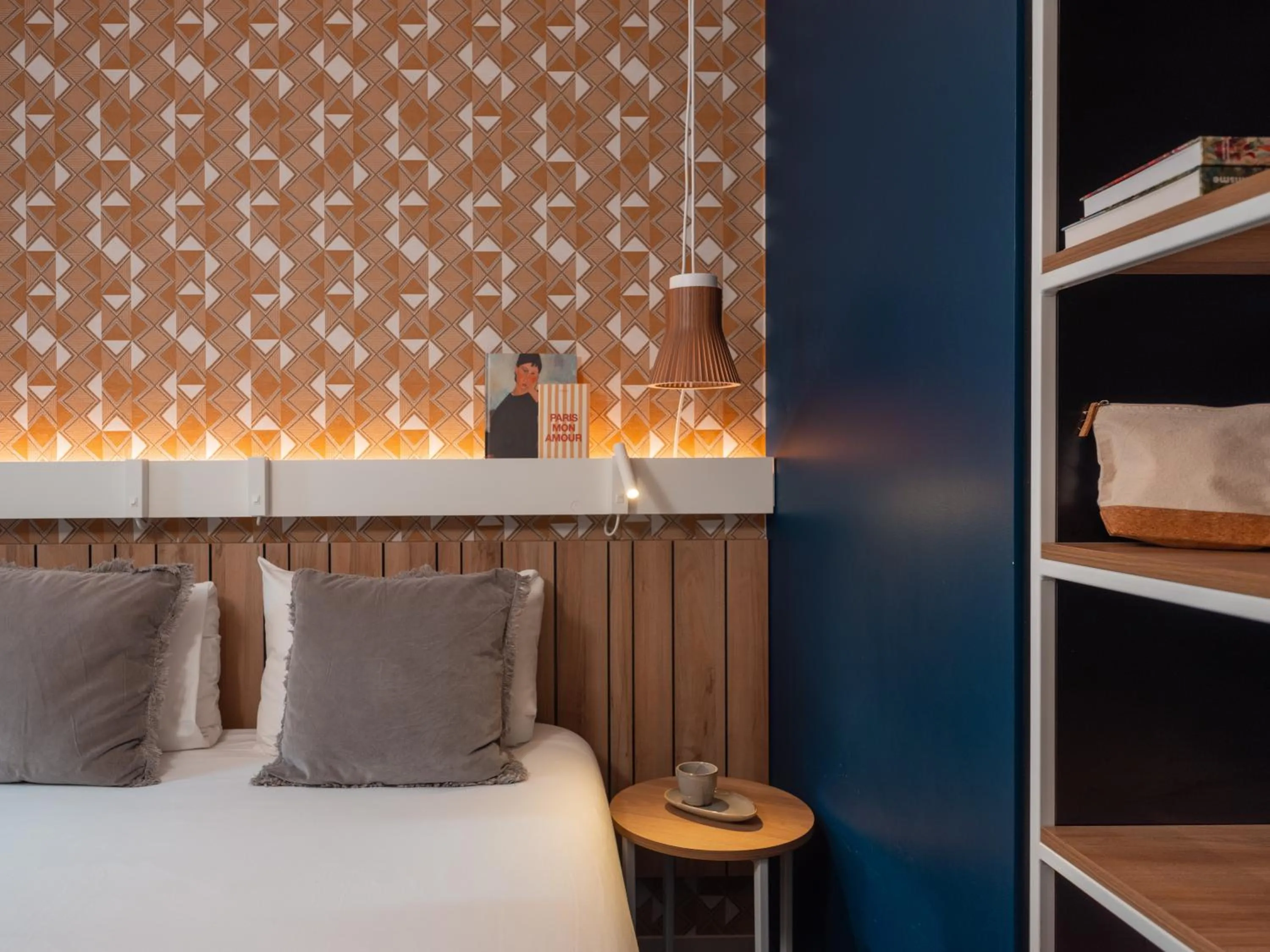 Decorative detail, Bed in Ibis Paris Gare Montparnasse Catalogne