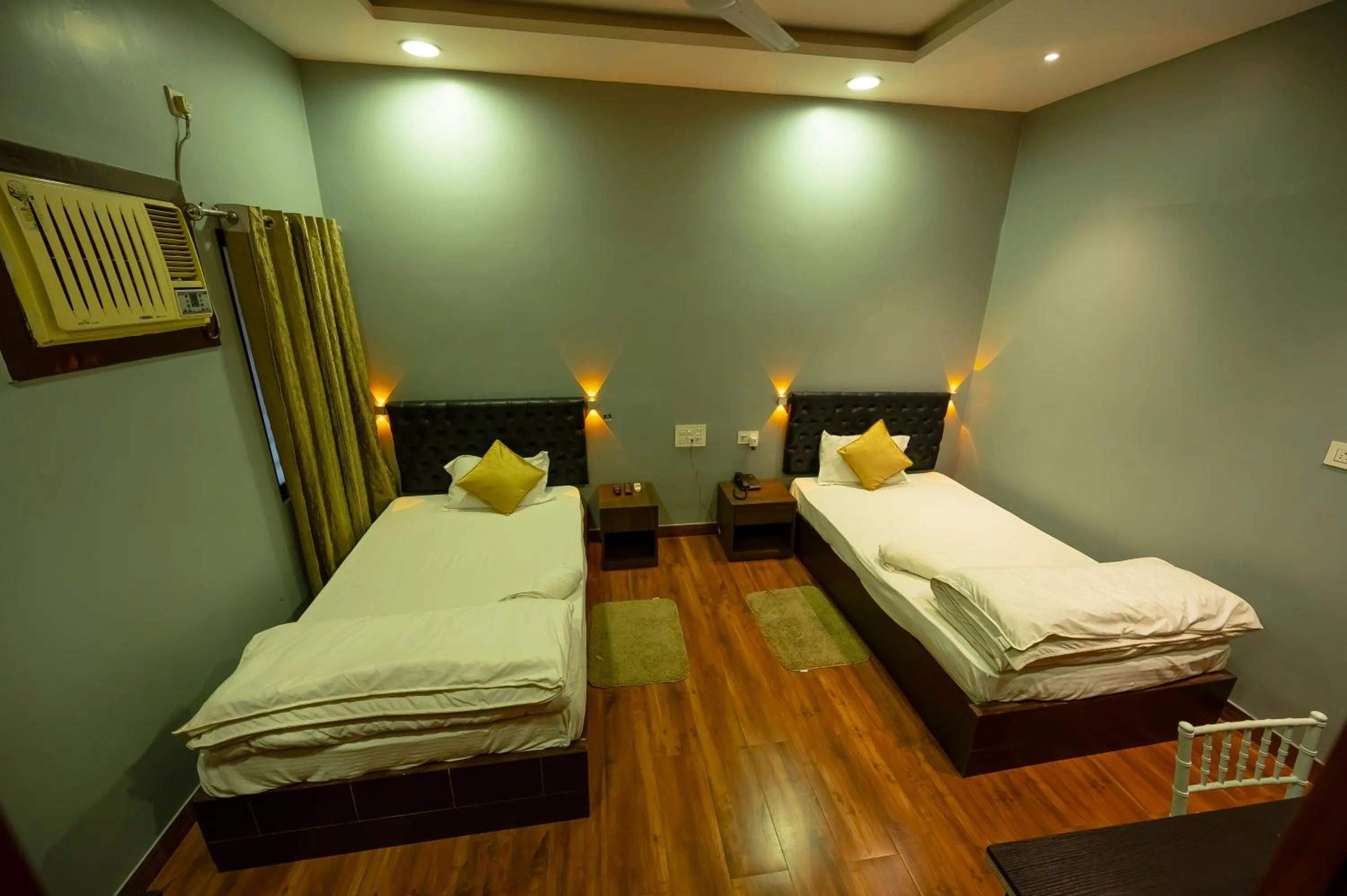 Bed in HOTEL MITTAL GARDEN