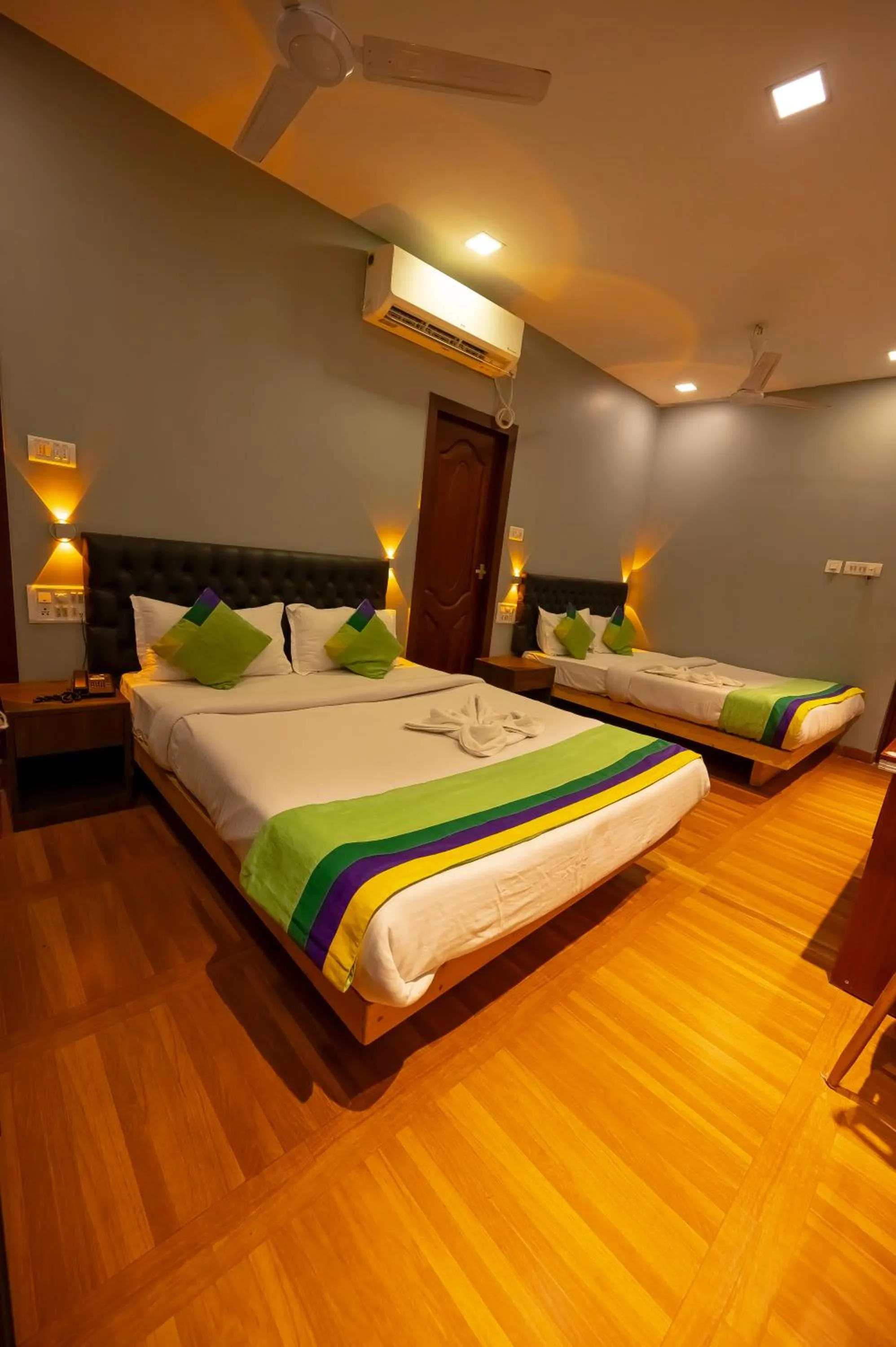 Bed in HOTEL MITTAL GARDEN