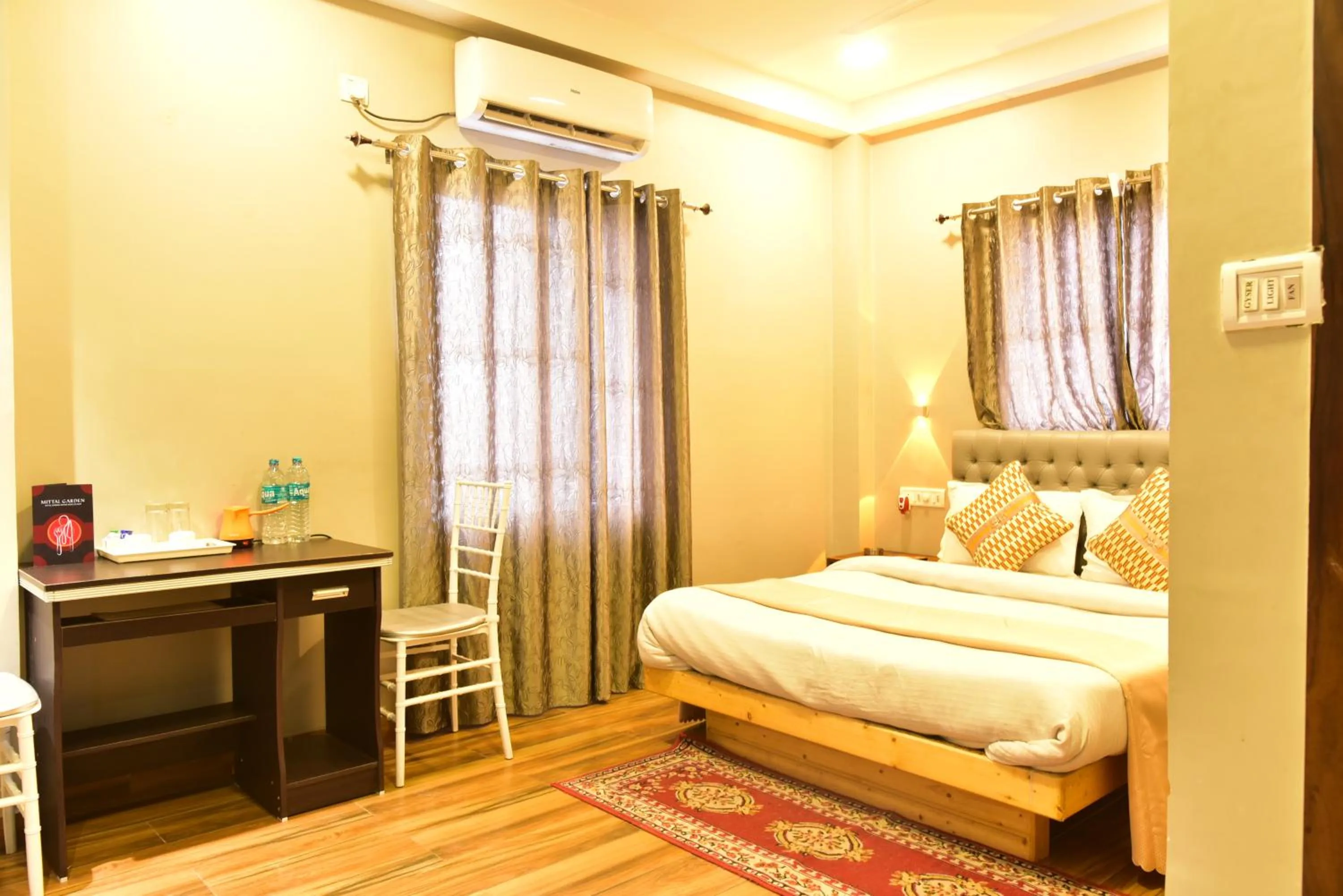 Bed in HOTEL MITTAL GARDEN