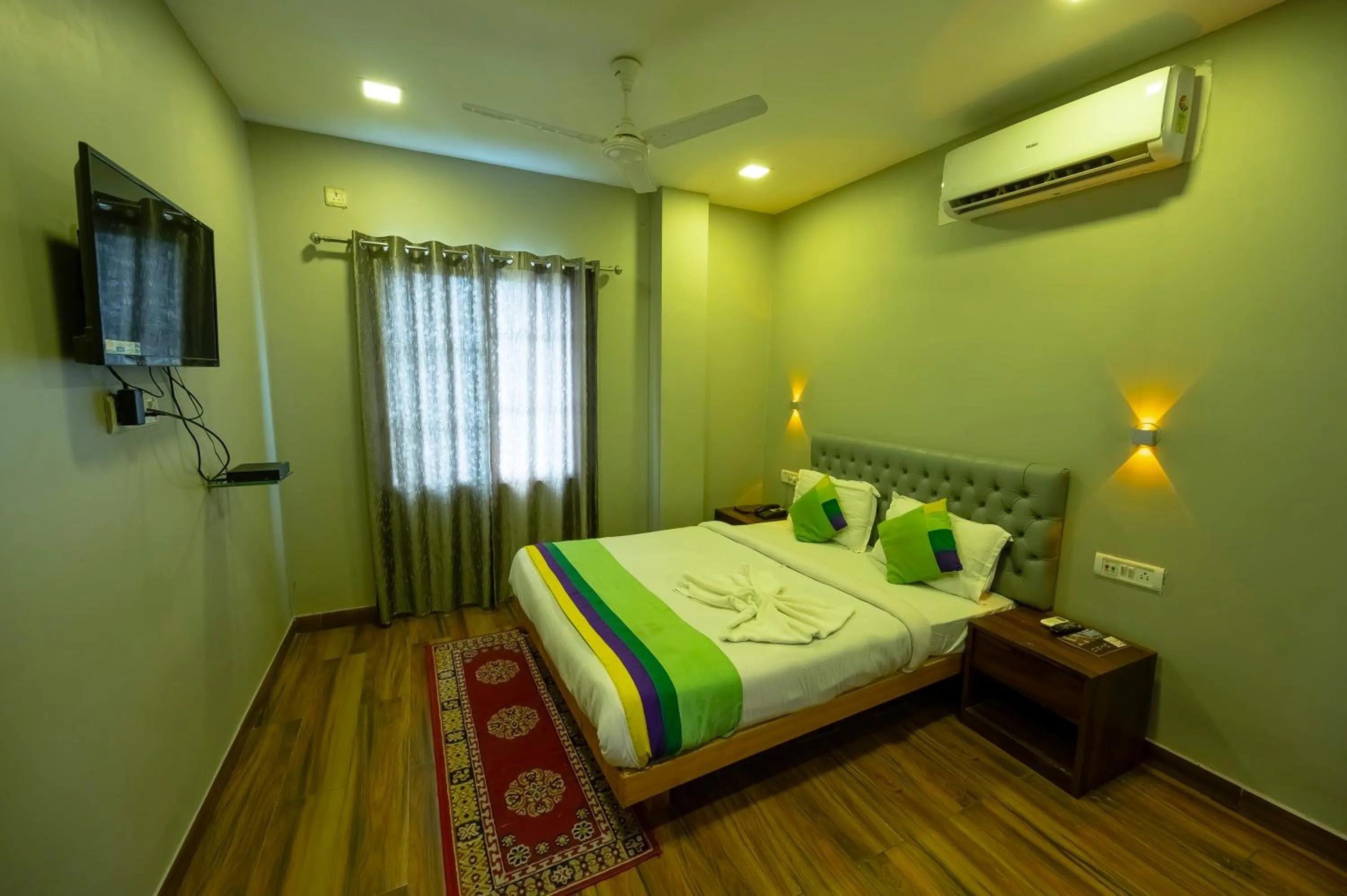 Bed in HOTEL MITTAL GARDEN