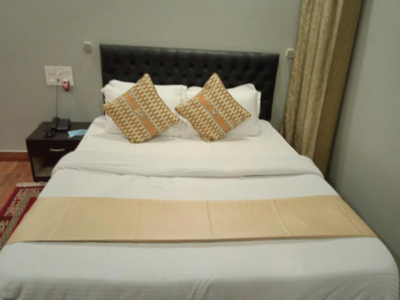Bed in HOTEL MITTAL GARDEN