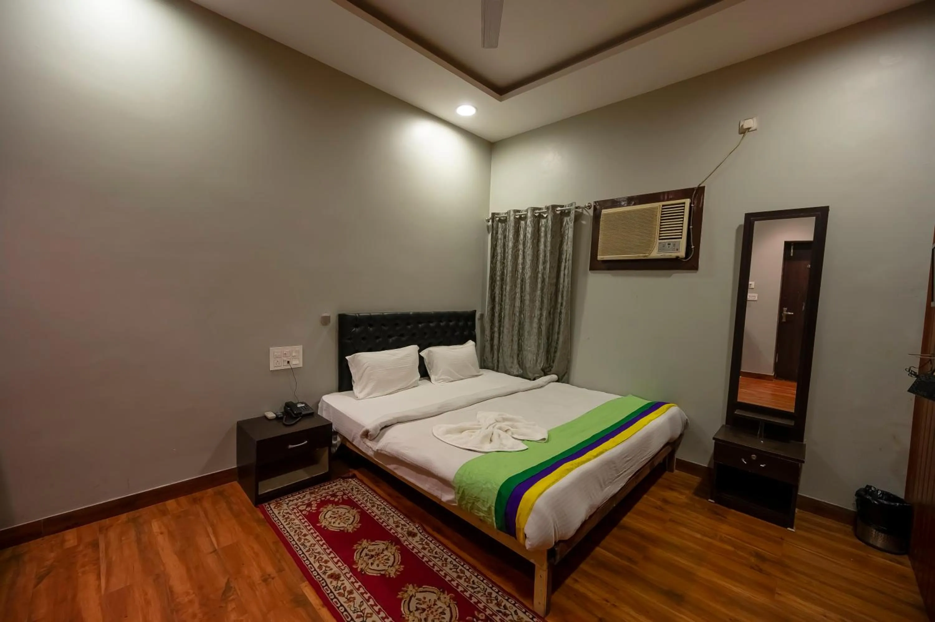 Bed in HOTEL MITTAL GARDEN