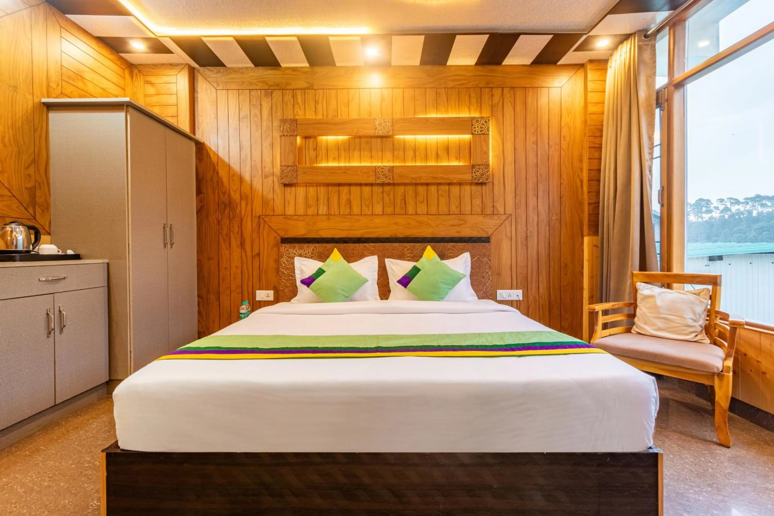 Bedroom in Treebo Srishti Vaikunth With Mountain View