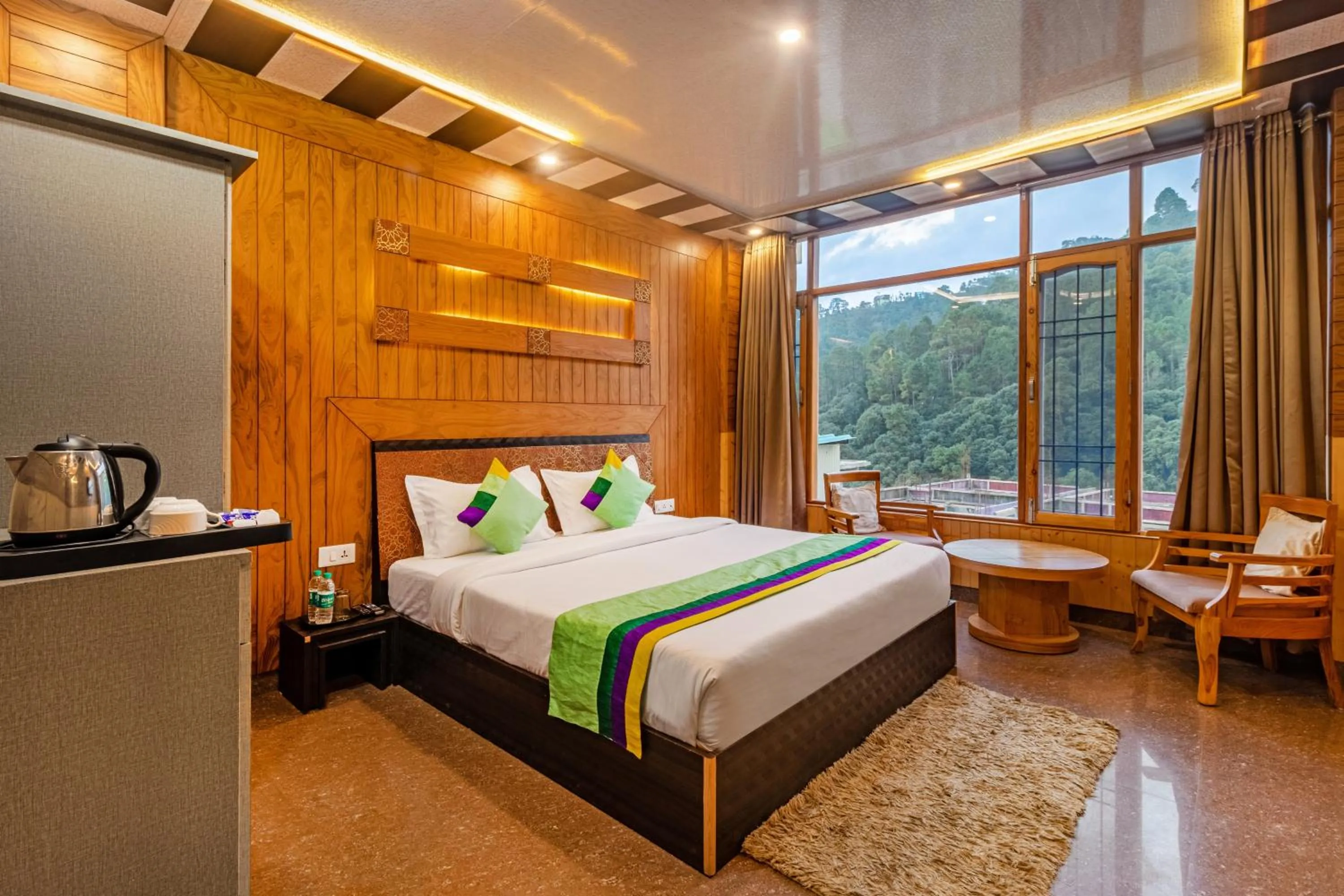 Bedroom in Treebo Srishti Vaikunth With Mountain View