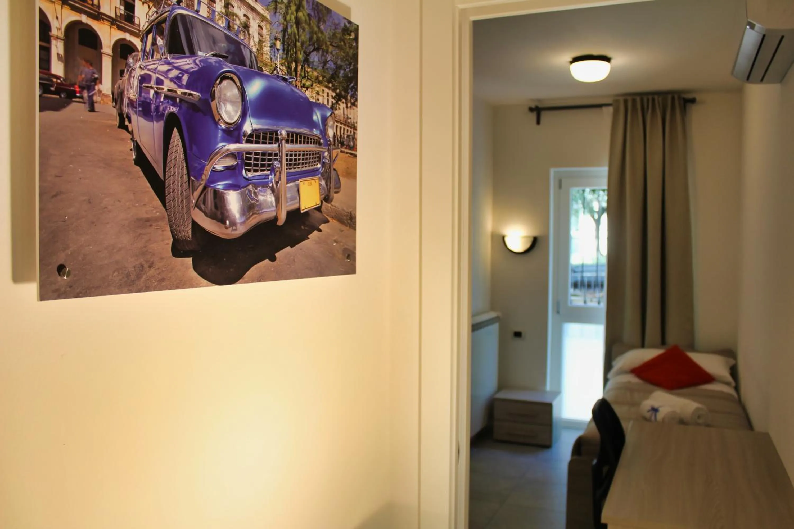 Photo of the whole room, Bed in Residence Bellavista