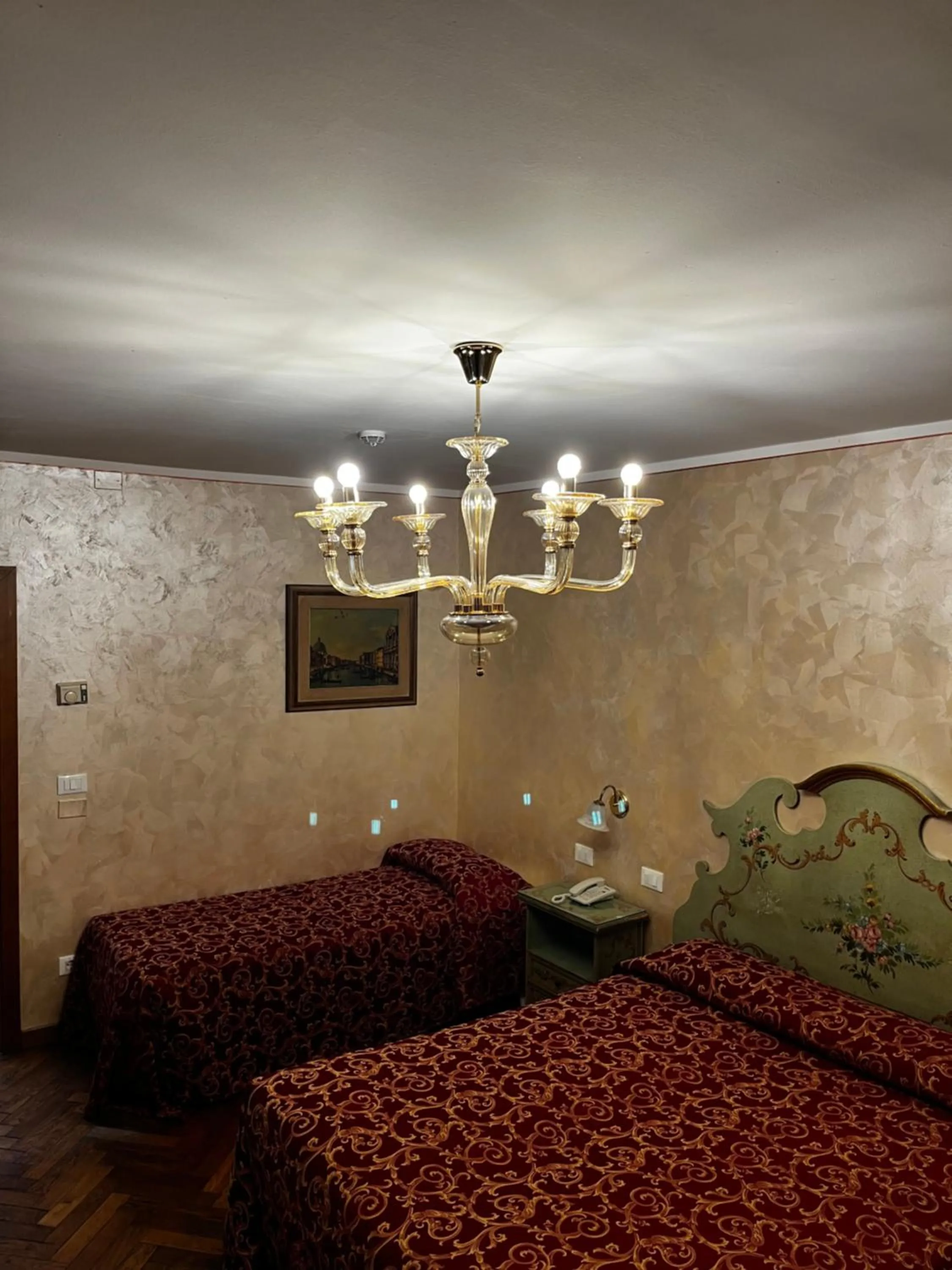 Bed in Hotel Malibran