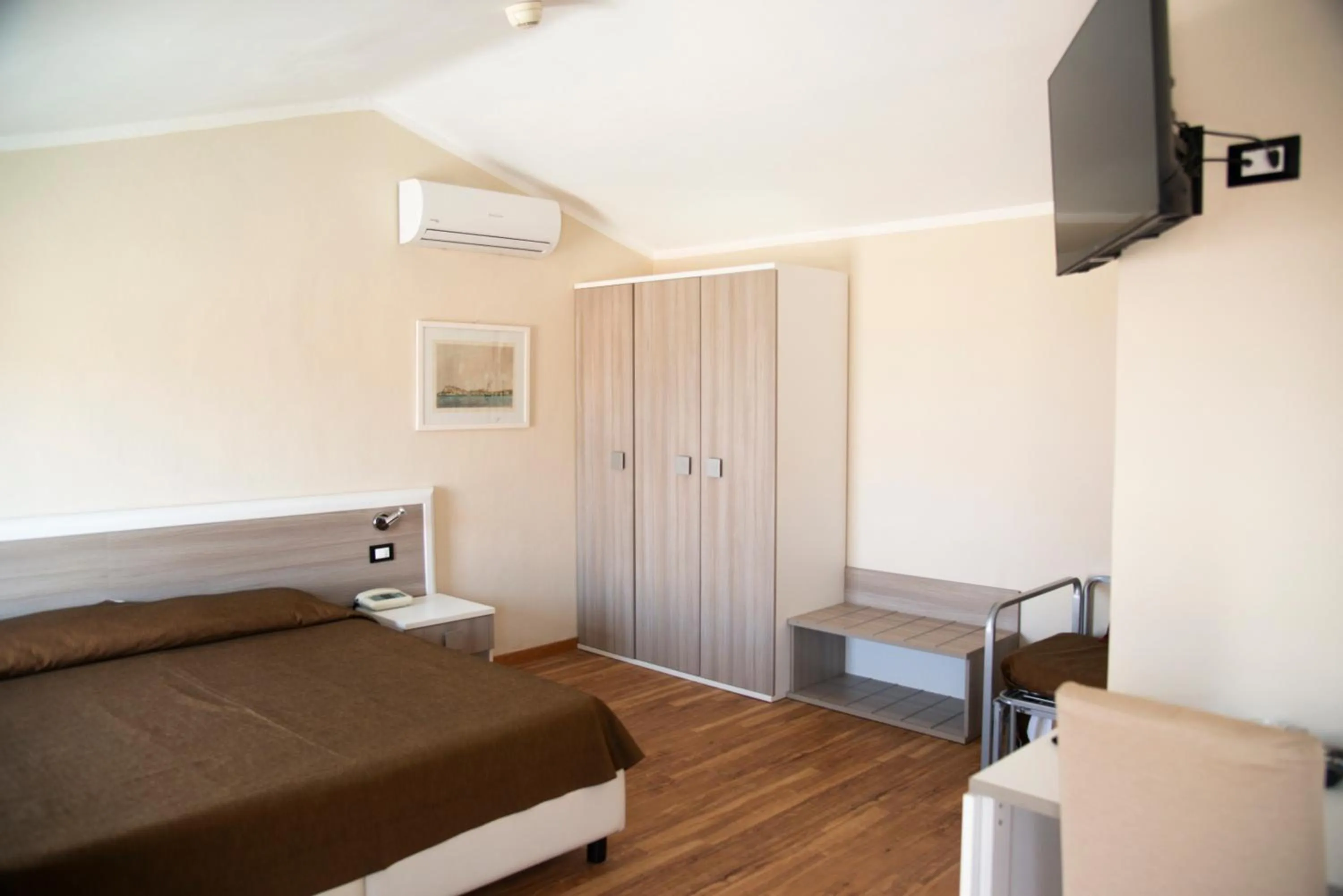 Bed in Hotel Fabricia