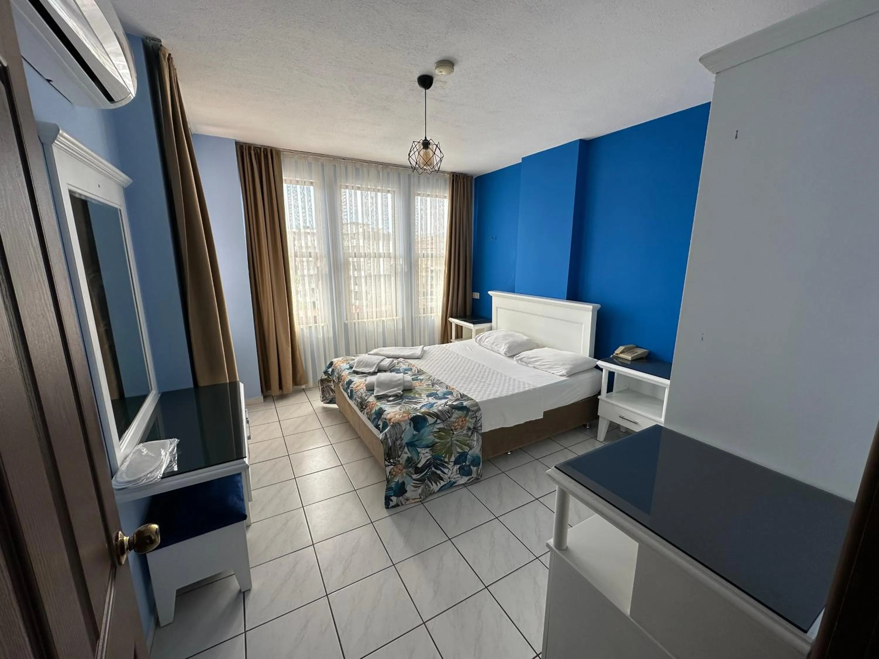 Bed in Maren City Apart Hotel