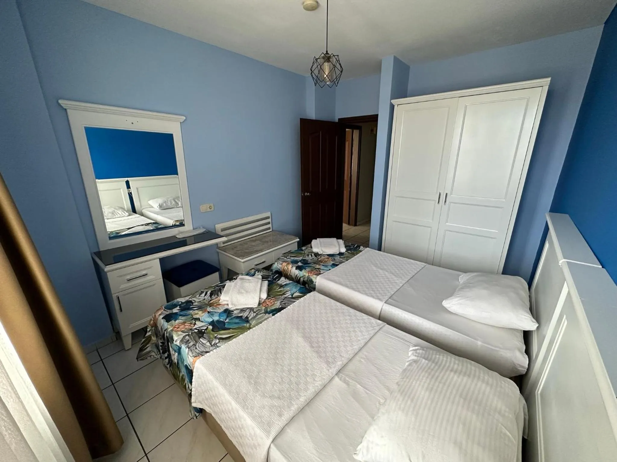 Bed in Maren City Apart Hotel