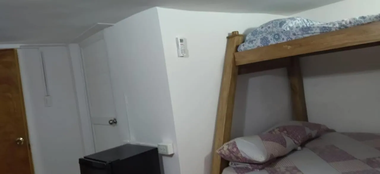Bed in JAMES & GOMEZ SOCIETY