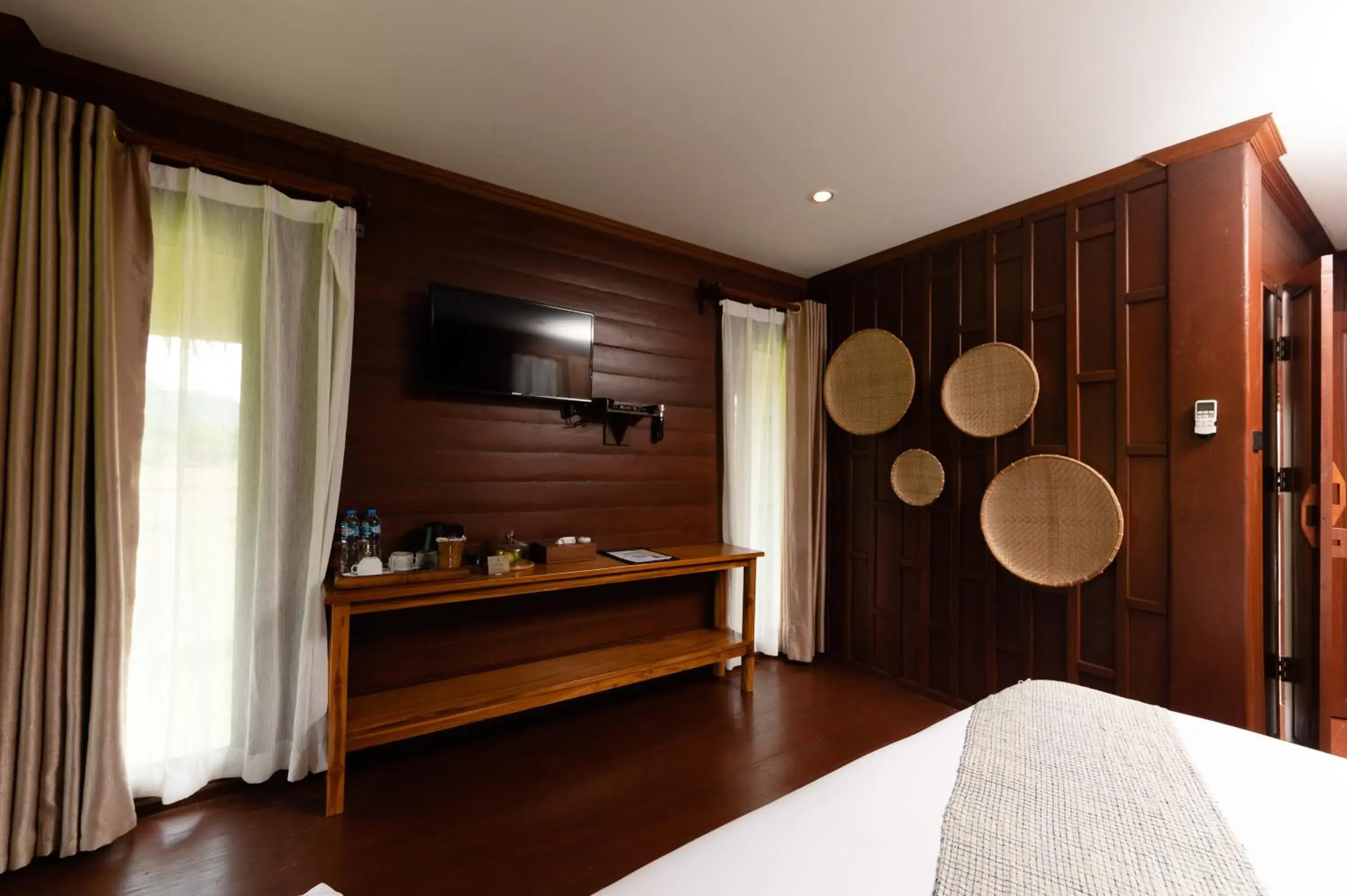 TV and multimedia, Bed in ViengTara VangVieng Resort TV and multimedia, Bed in ViengTara VangVieng Resort