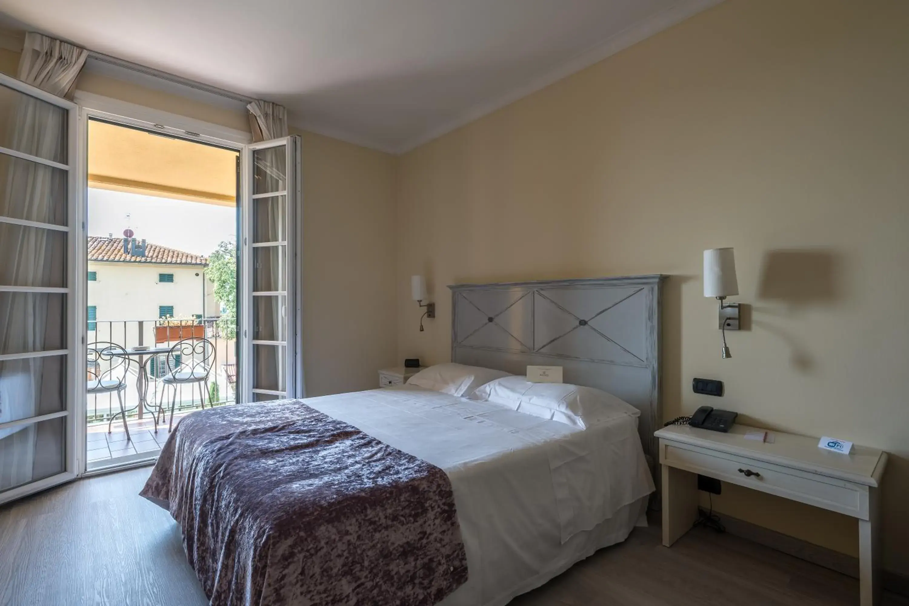 Deluxe Triple Room with Balcony in Hotel Villa Cappugi Deluxe Triple Room with Balcony in Hotel Villa Cappugi