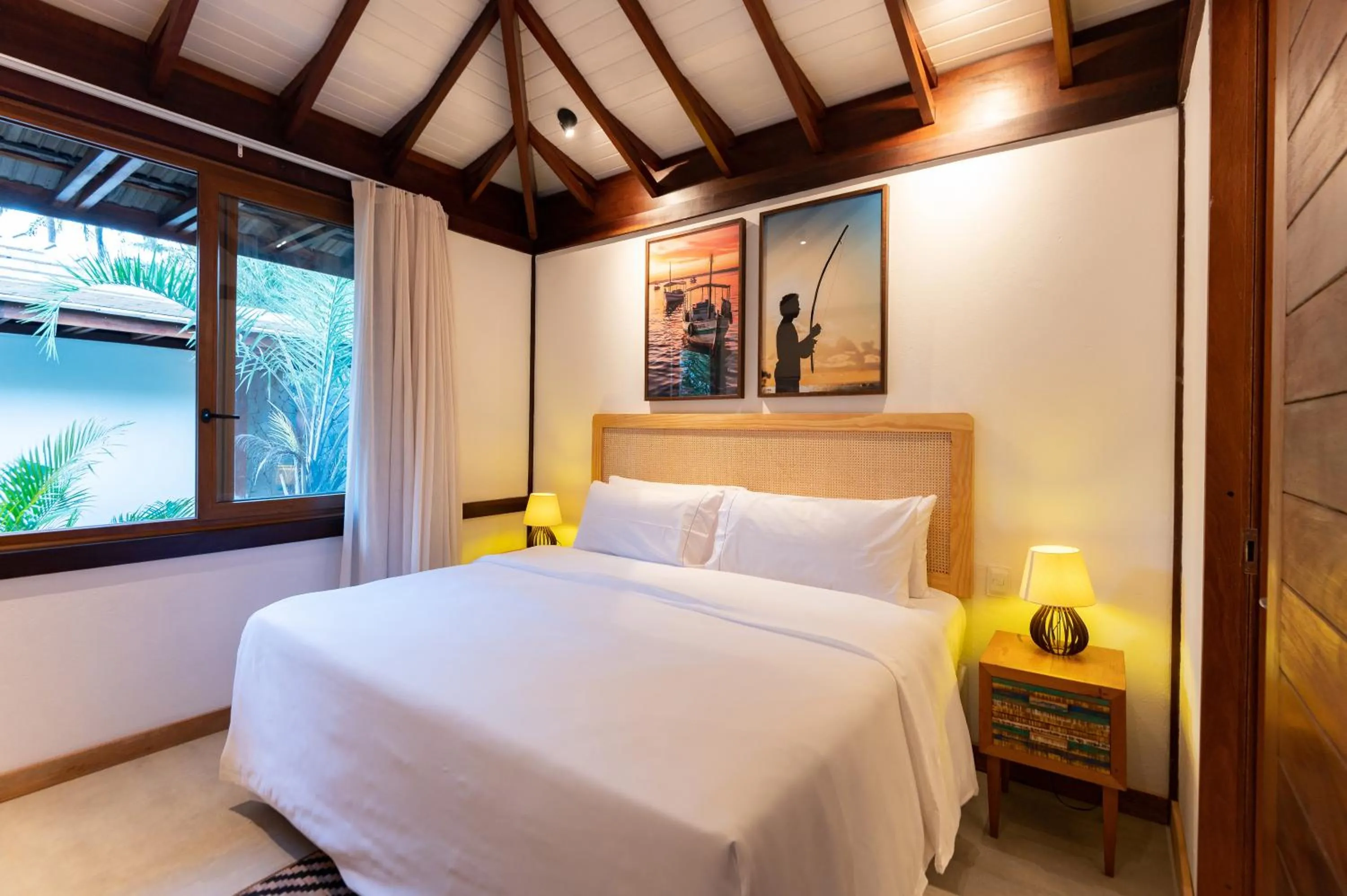 Bed in Colibri Beach Villas