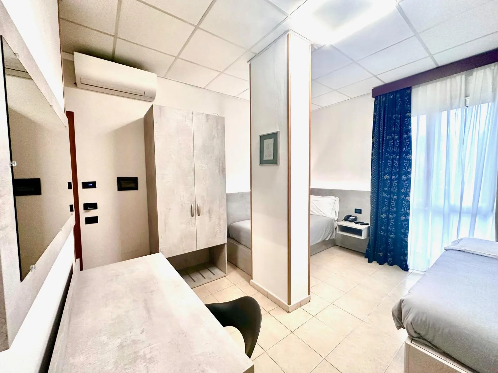 Bed in Hotel Leonardo