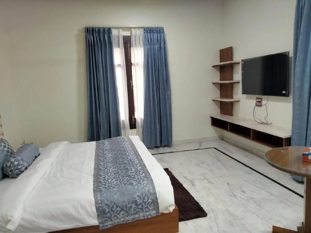 Bedroom in Matoshree Club and Resort