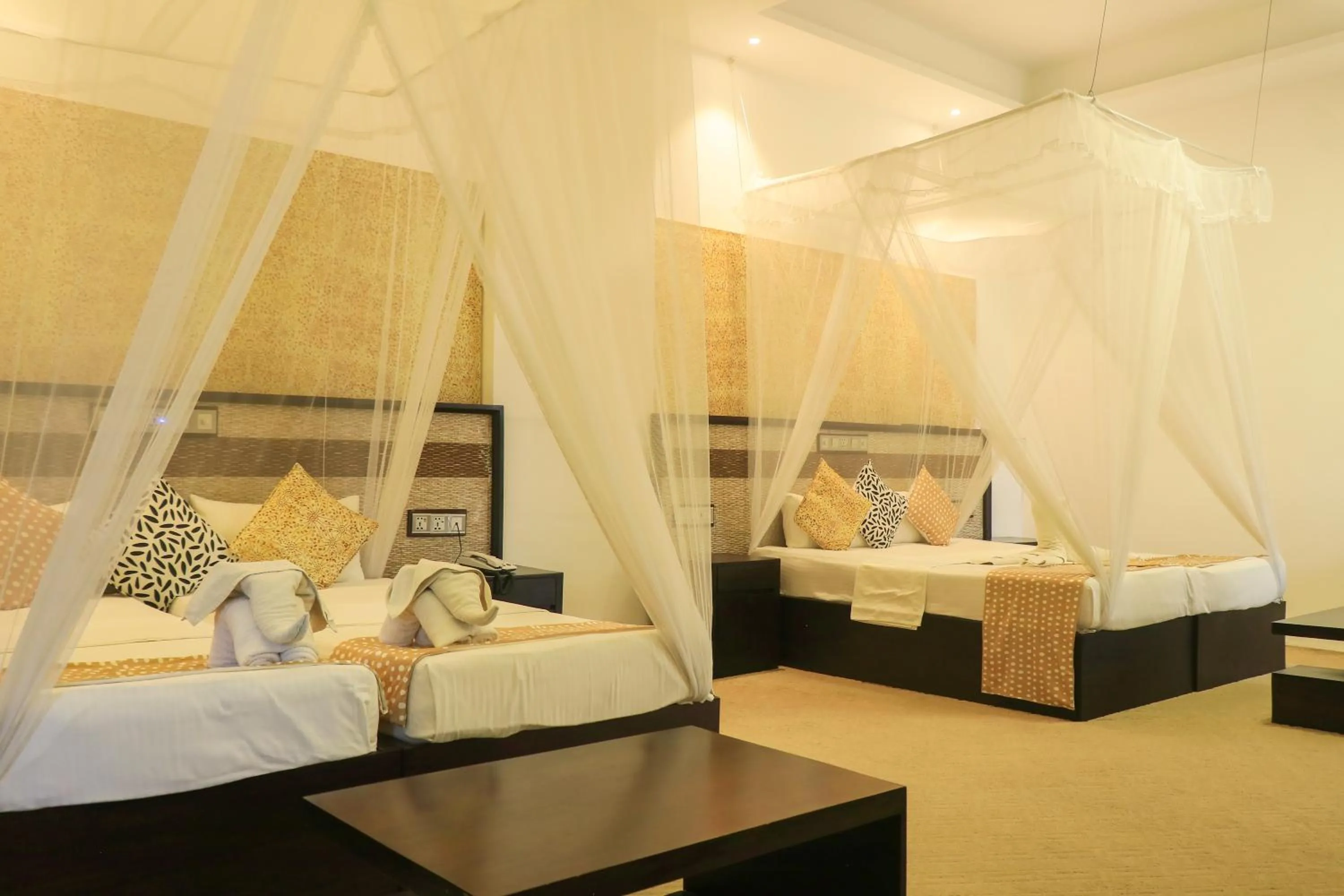 Bed in Thissa Inn Hotel