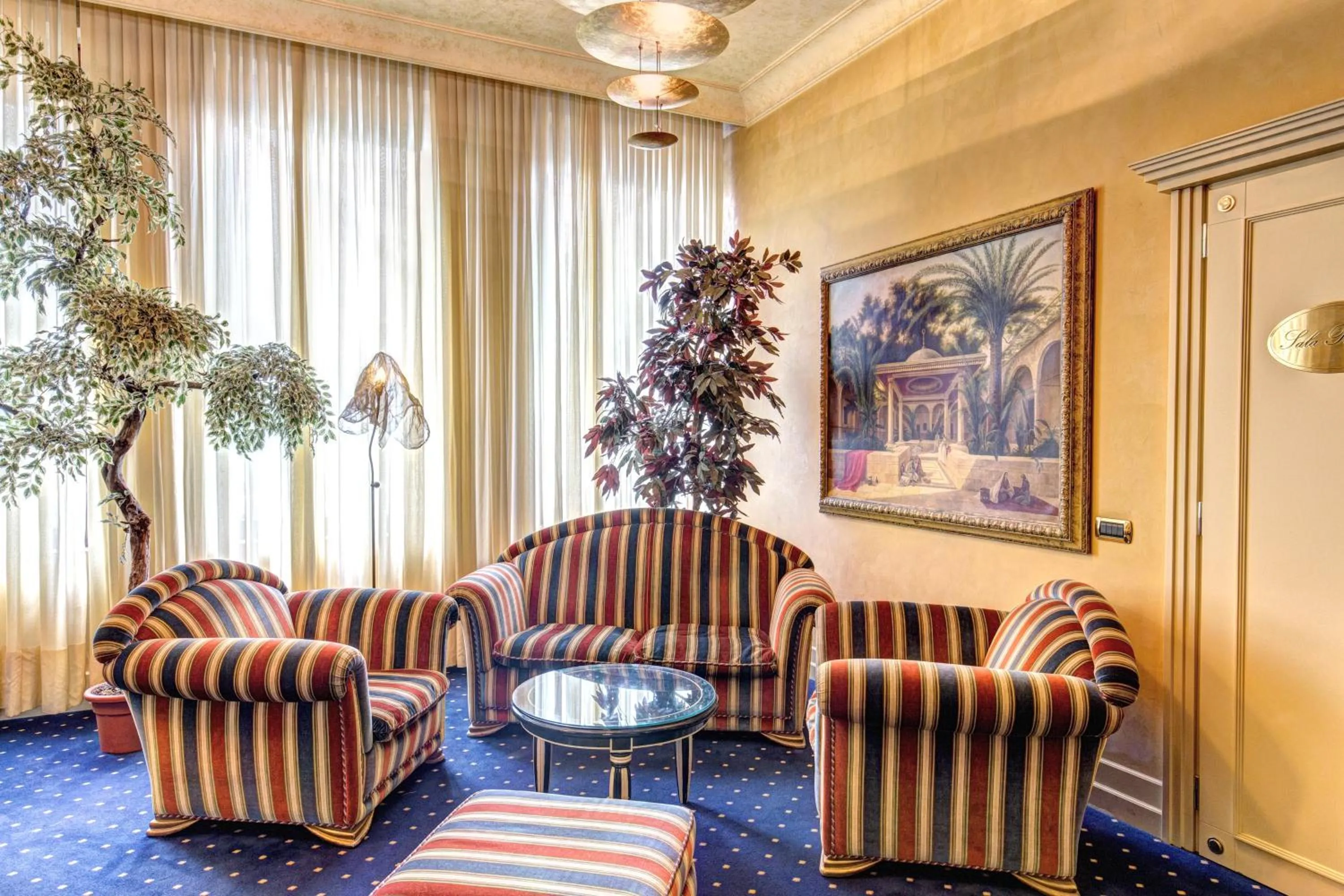 Communal lounge/ TV room in Hotel Auriga