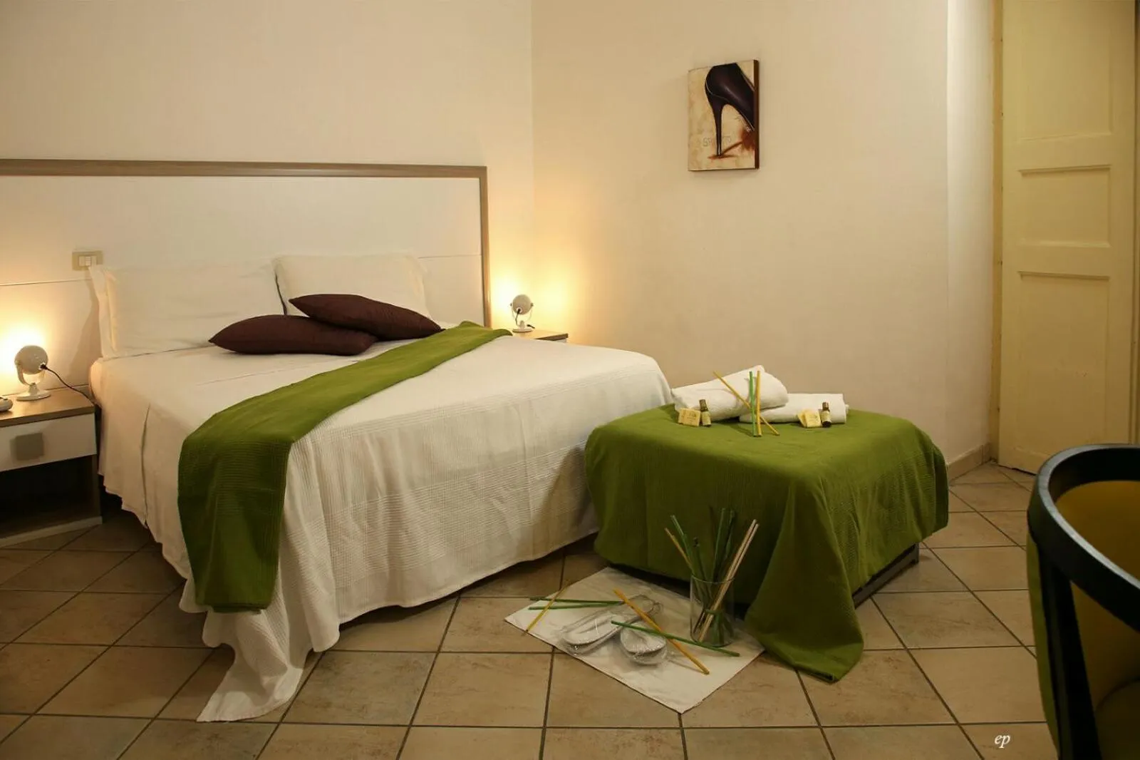 Bed in Caravaggio Hotel