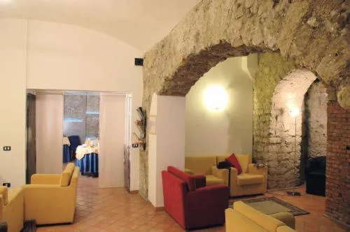 Communal lounge/ TV room in Caravaggio Hotel