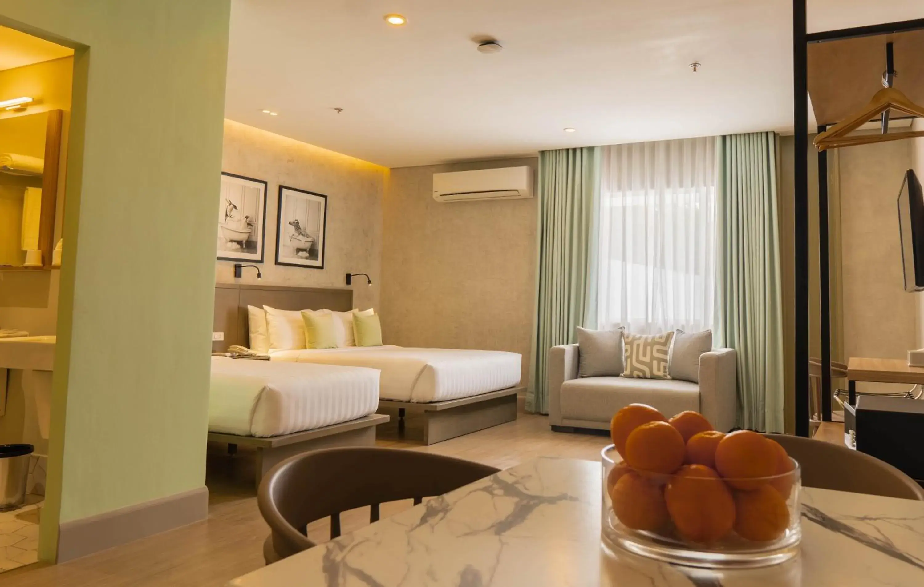 Photo of the whole room, Bed in Primeway Suites Cebu Photo of the whole room, Bed in Primeway Suites Cebu