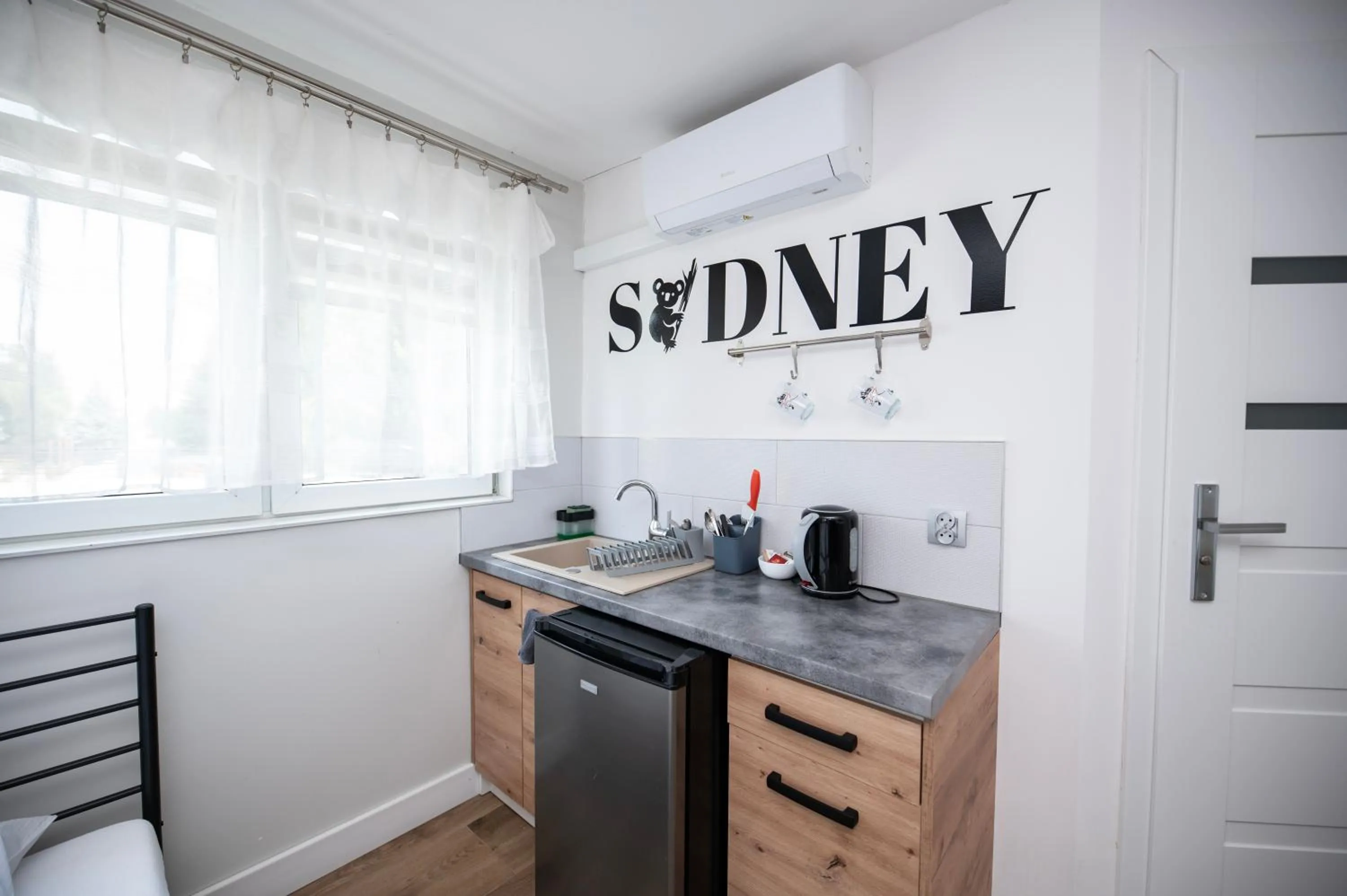 Kitchen or kitchenette in City Place Noclegi