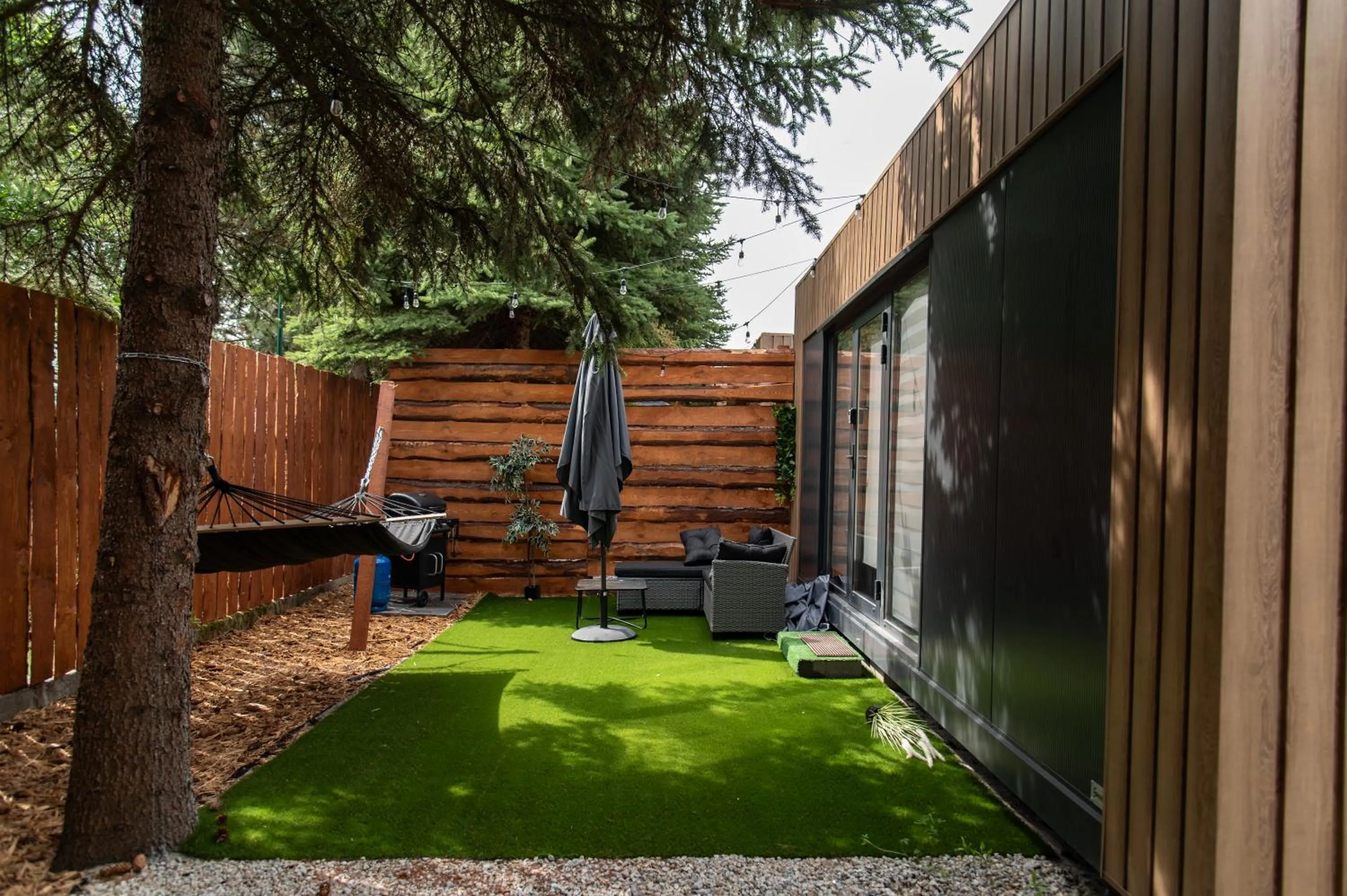 Garden view in City Place Noclegi