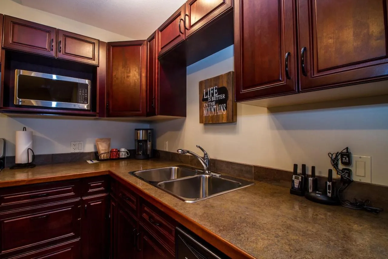 Kitchen or kitchenette in Give Something Back Retreat by Revelstoke Vacations