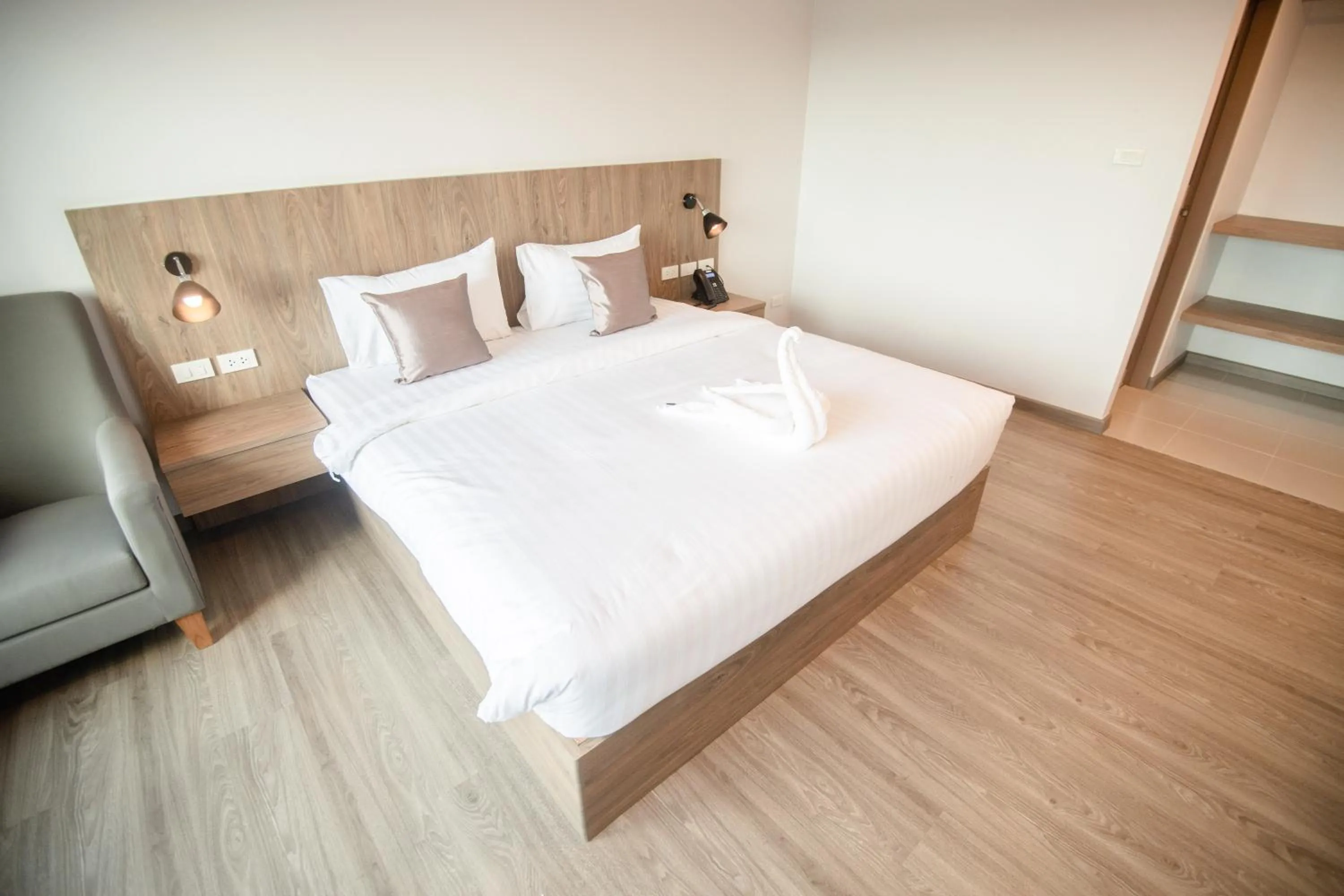 Photo of the whole room, Bed in Nakara Hotel, Ubon Ratchathani