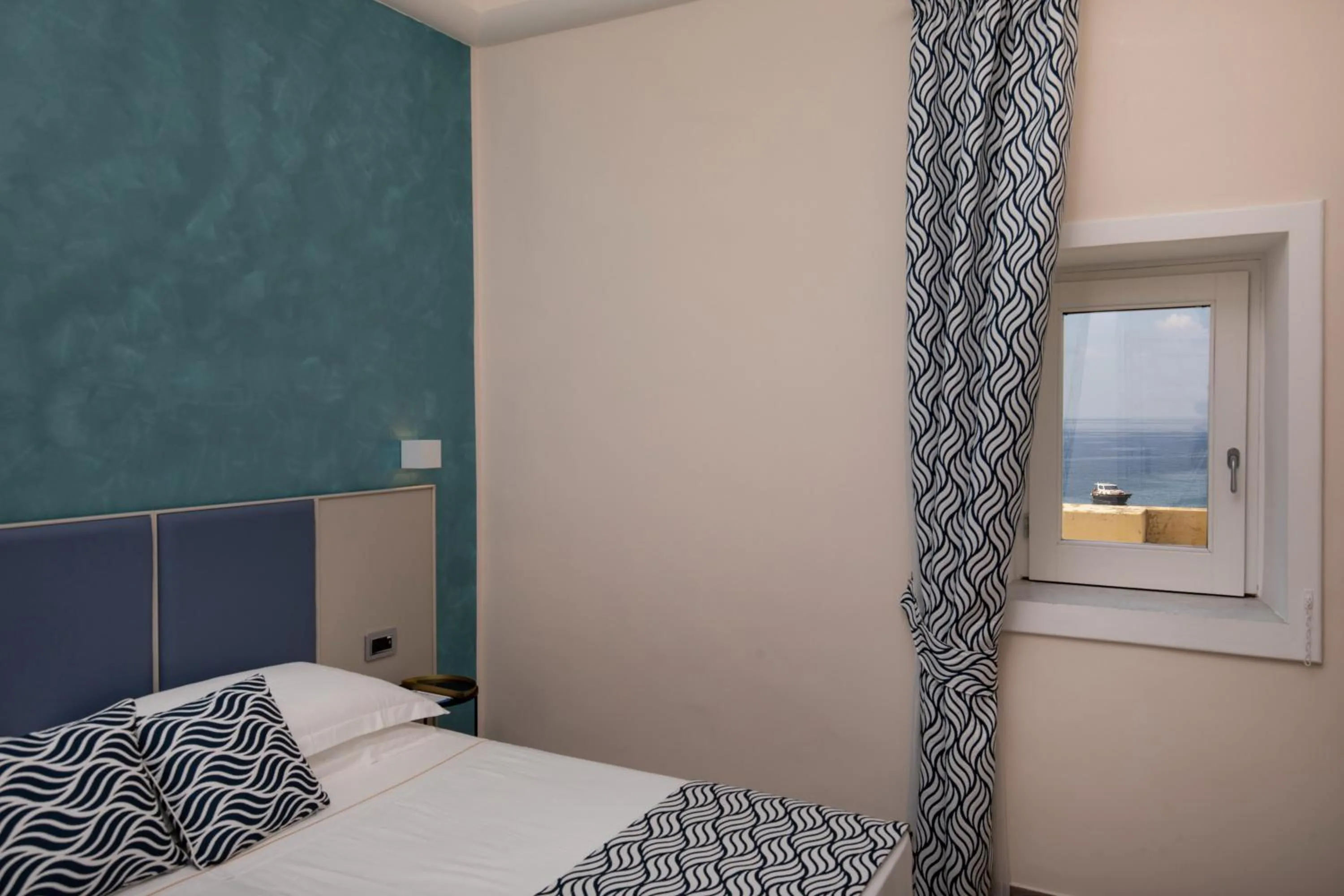 Bed in Hotel L'Ariana ISOLE EOLIE - UNA Esperienze