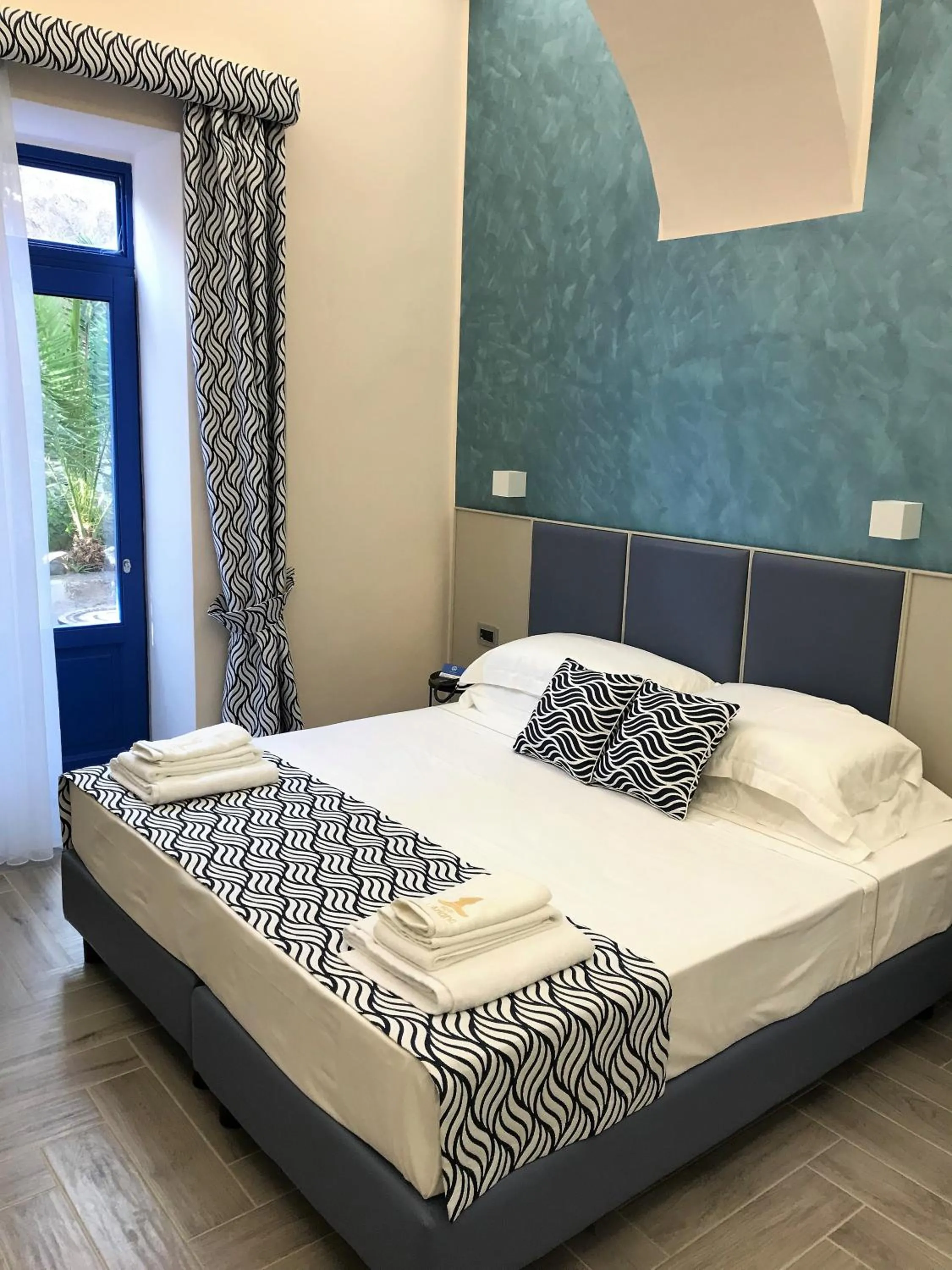Bed in Hotel L'Ariana ISOLE EOLIE - UNA Esperienze