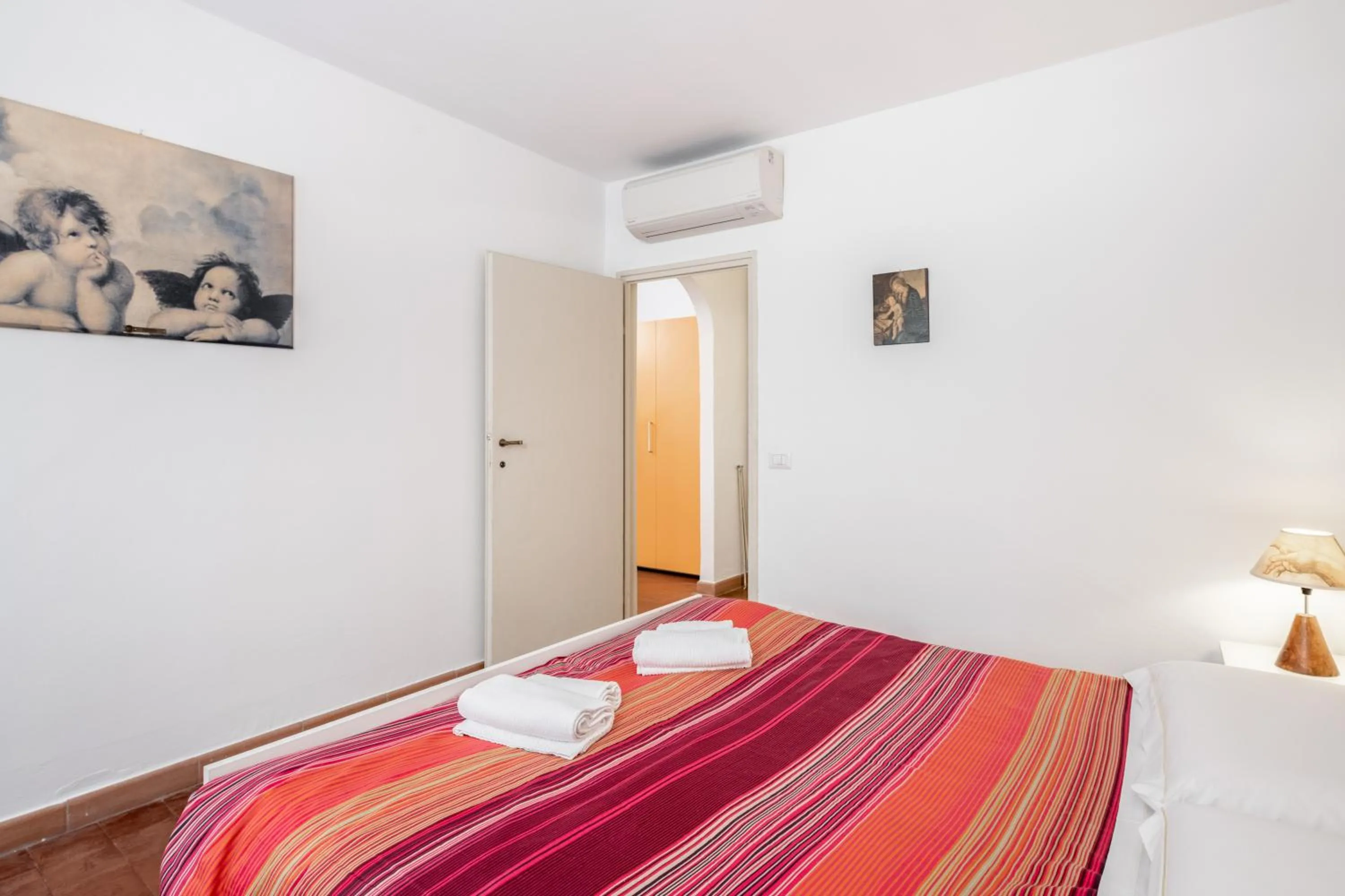 Bedroom, Bed in GuestHost - Torre dei Giudi apartments