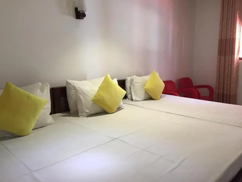 Standard Triple Room in Thisara Guest House Standard Triple Room in Thisara Guest House