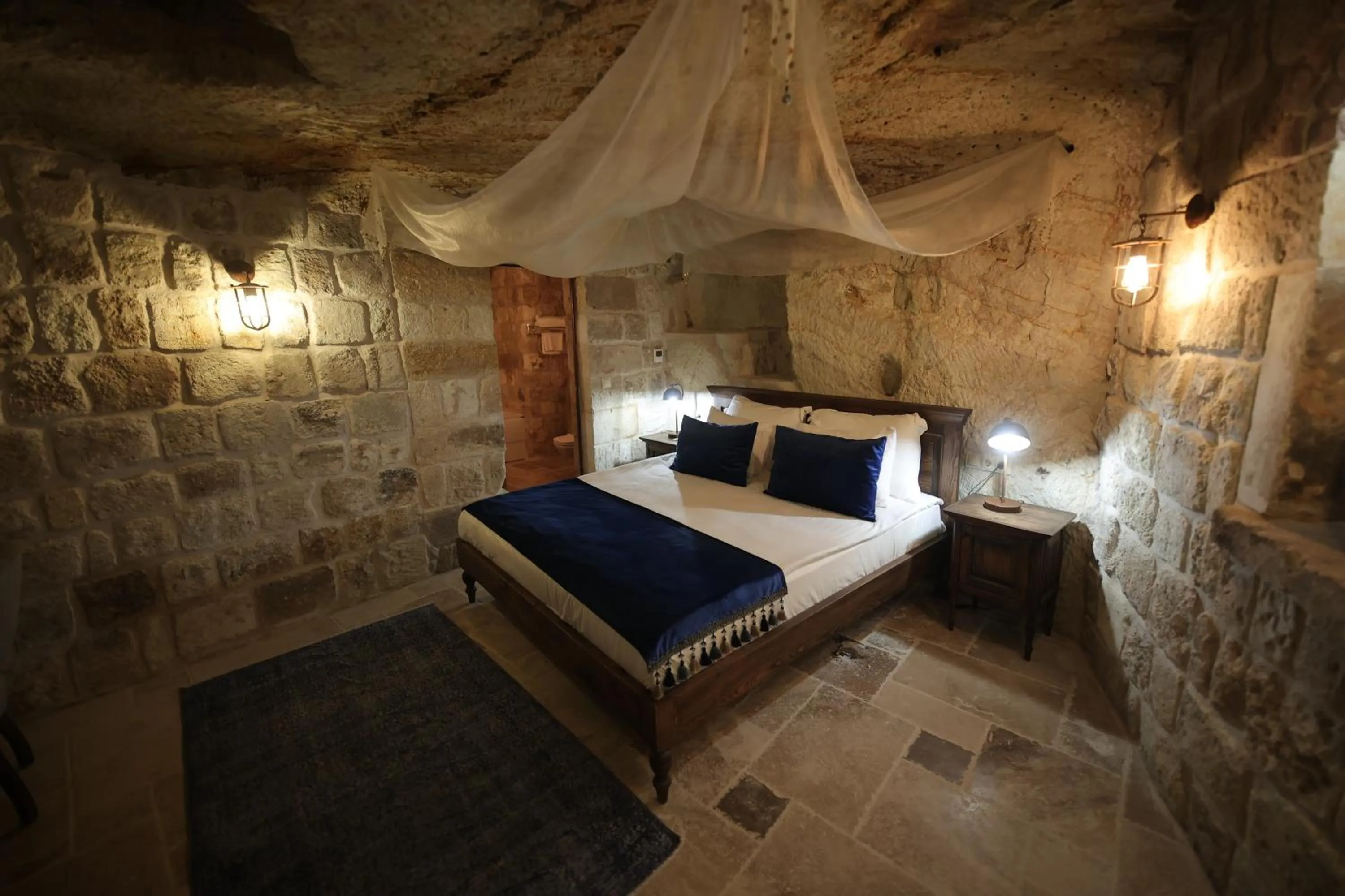 Bed in Ürgüp Cave Suites