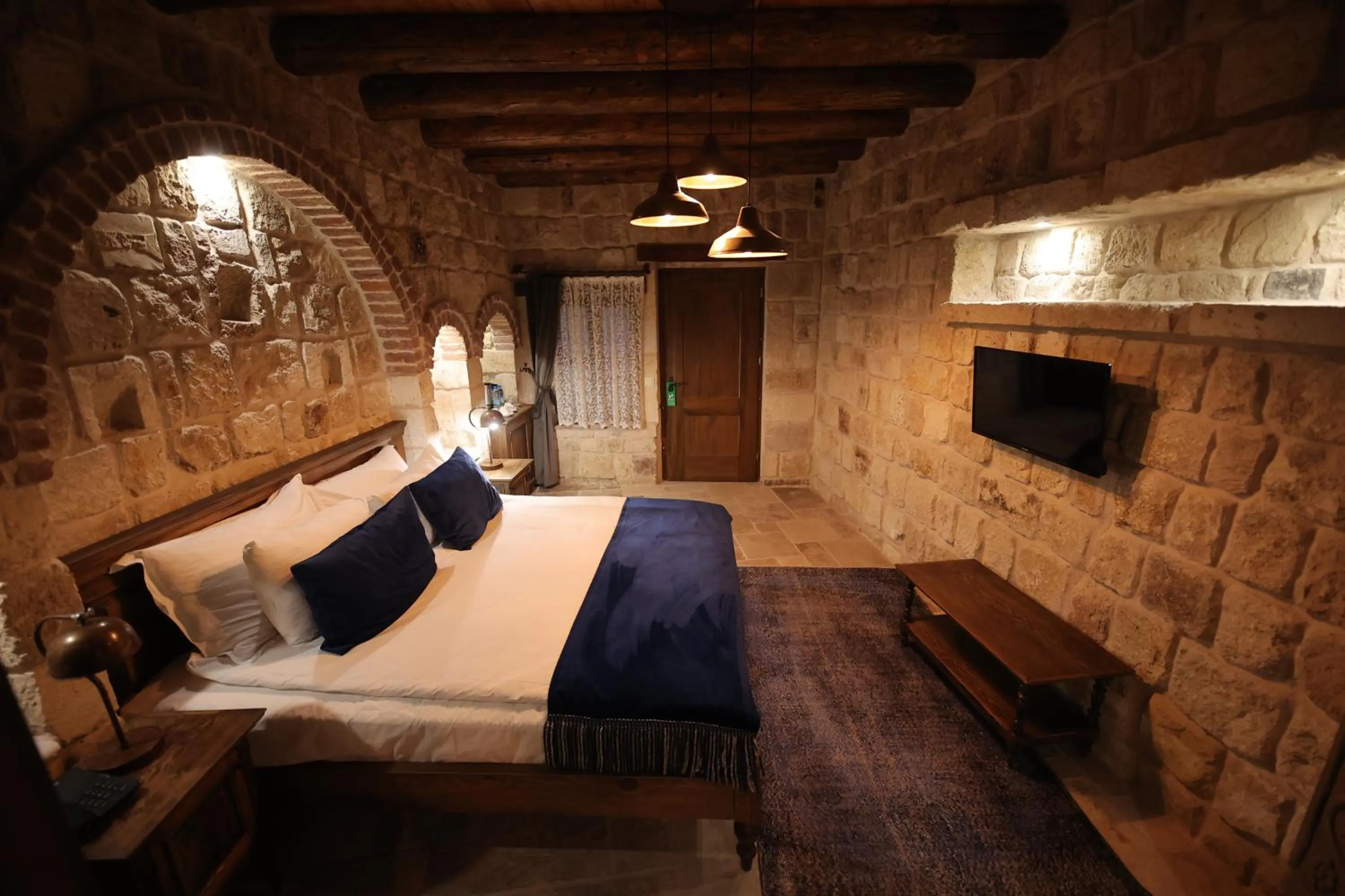 Bed in Ürgüp Cave Suites