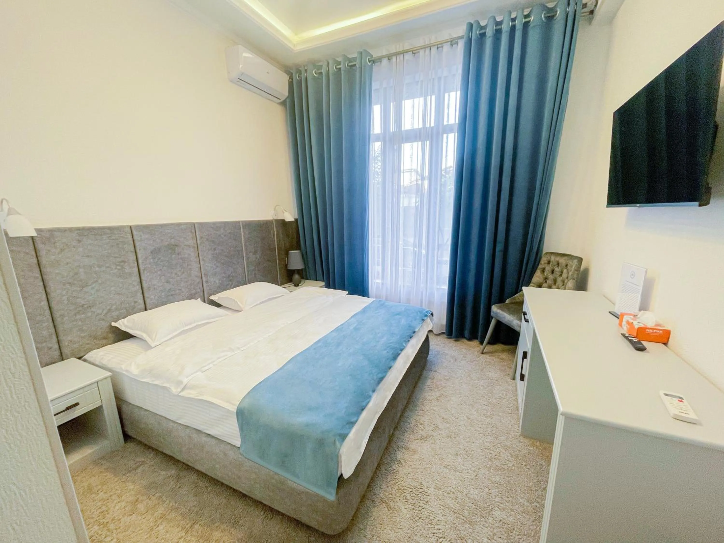 Bed in Shohjahon Palace Hotel & Spa