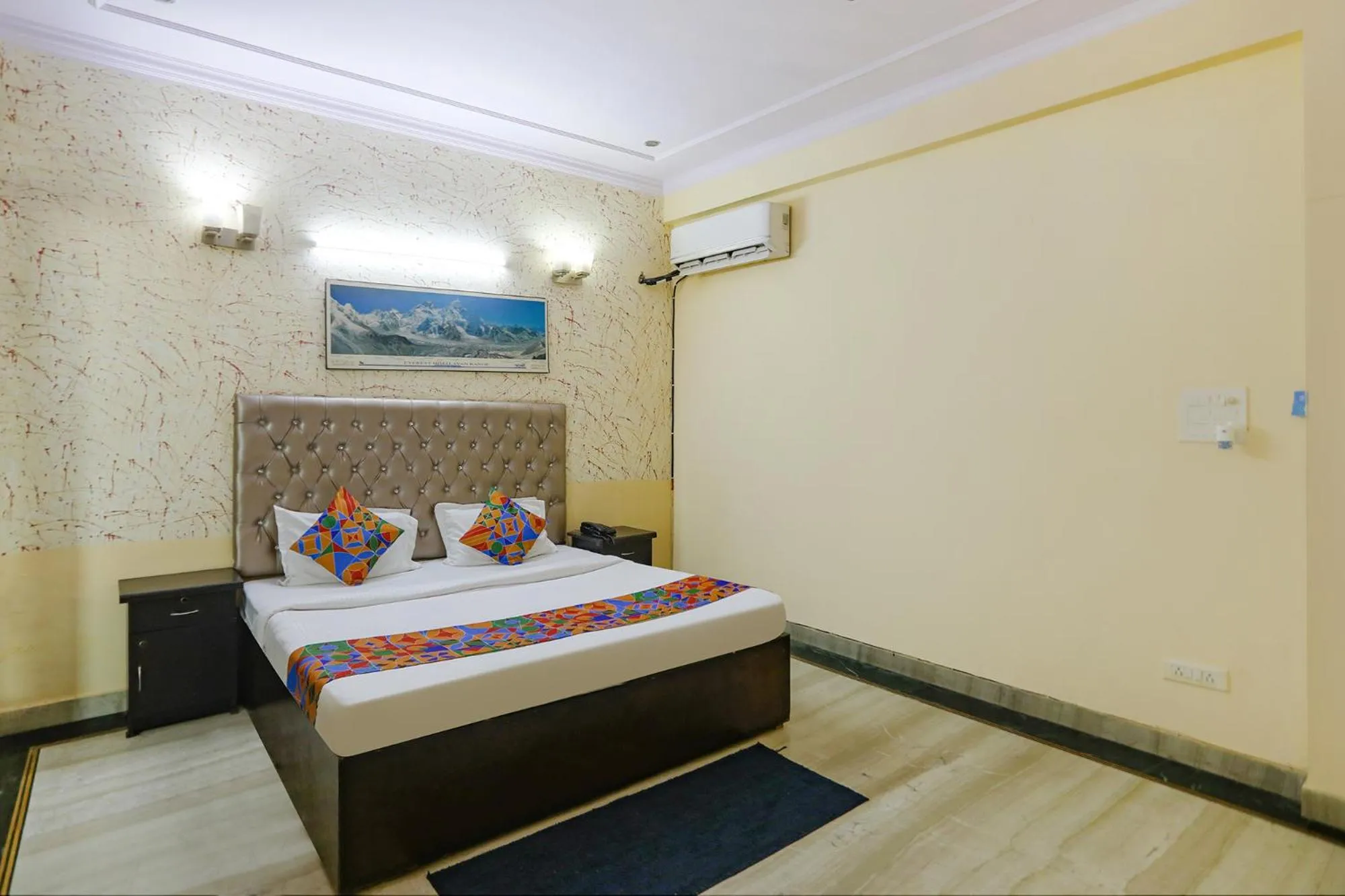 Bed in FabHotel HM Palace